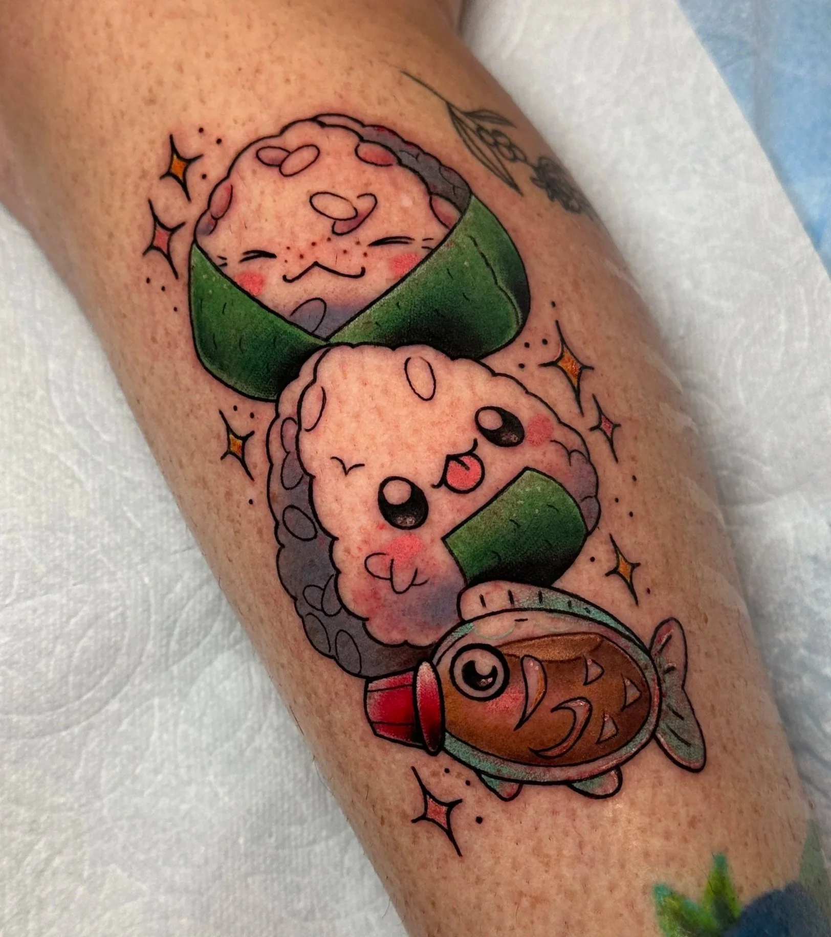 Sushi tattoo by San Diego Tattoo Artist Kristine Tran