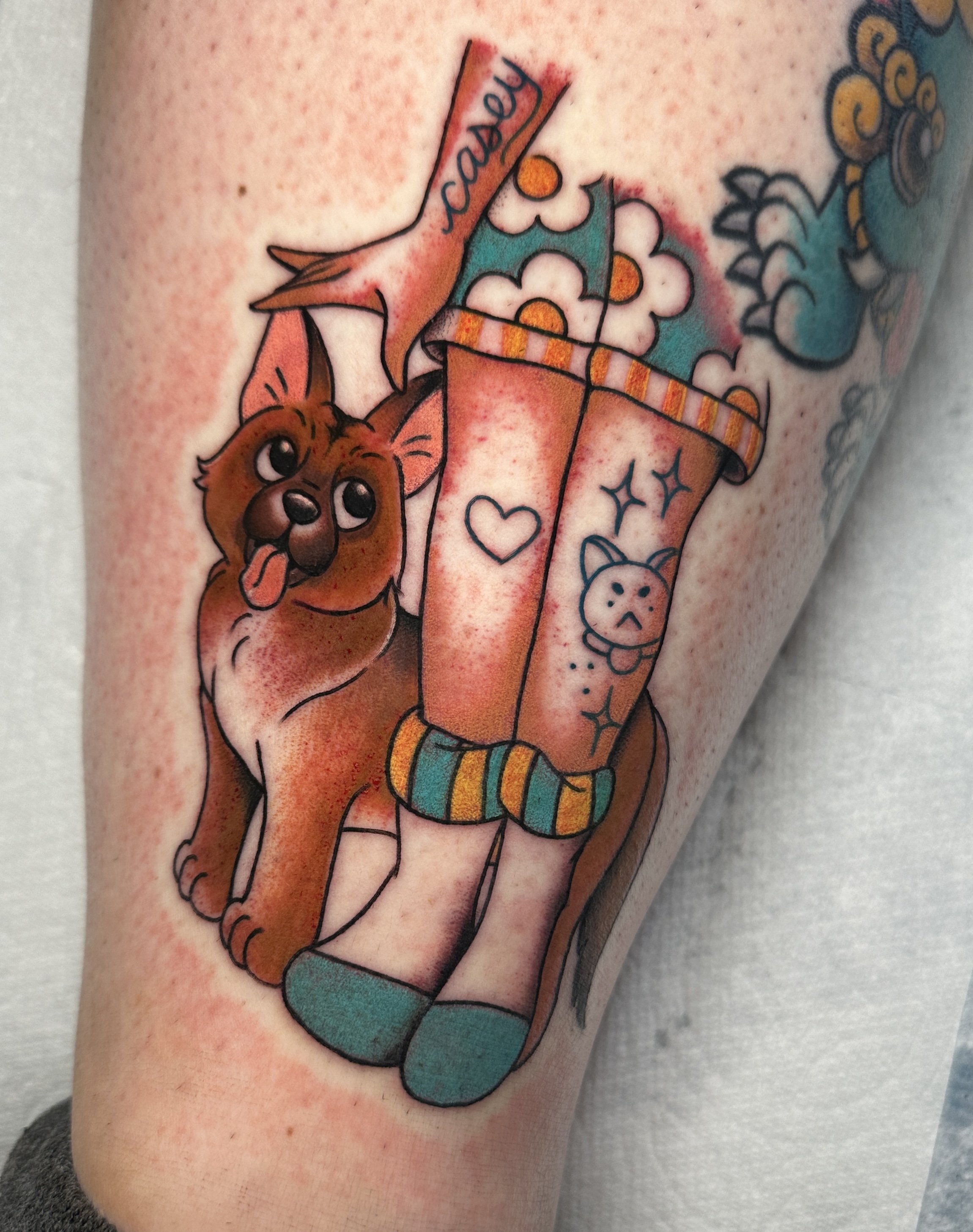 Cute dog tattoo in San Diego by ktrantattoos