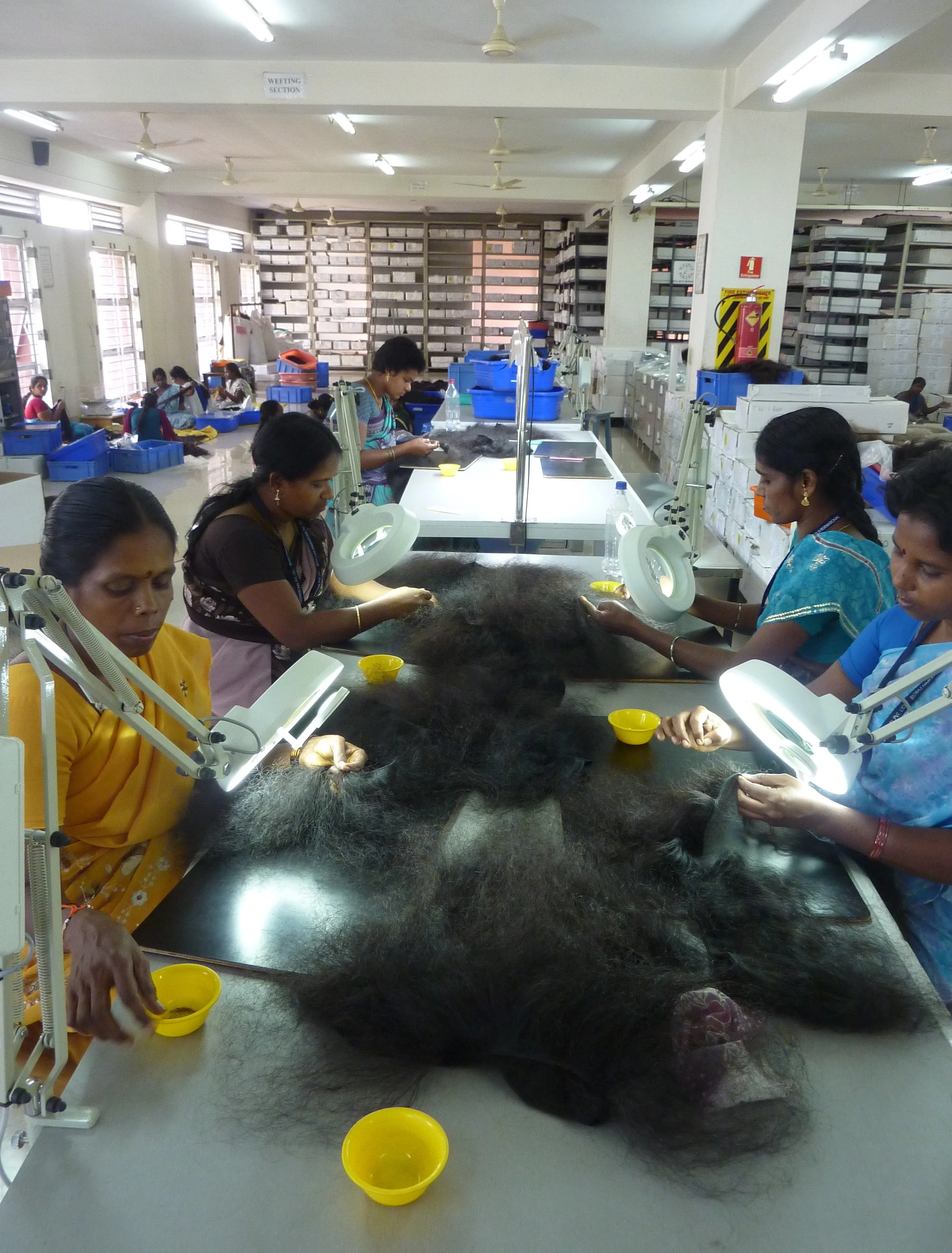 Emma Tarlo removing lice in hair factory Chennai.JPG