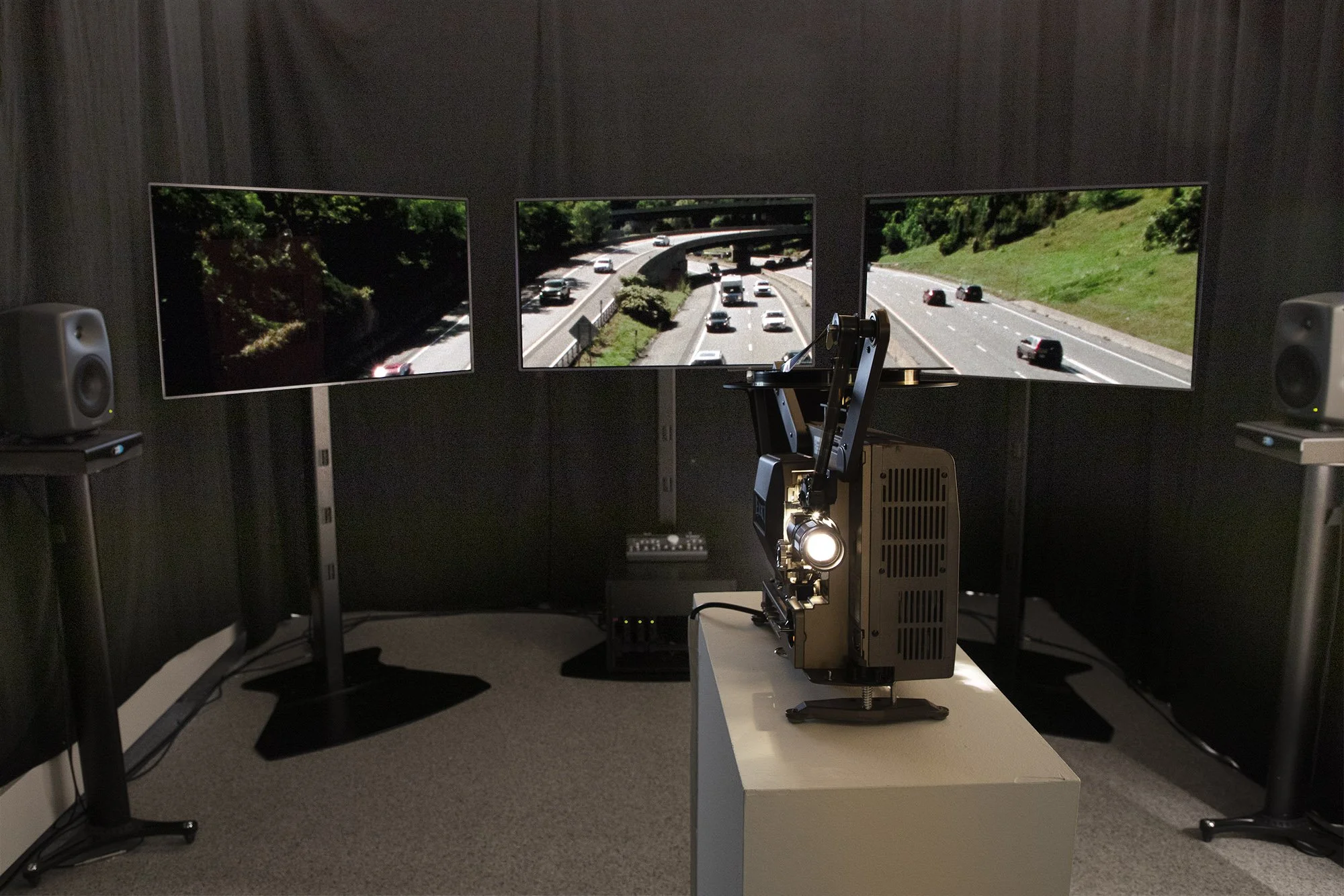 265Screens_Install_OutOfBody2026_3 Channel Film.jpg