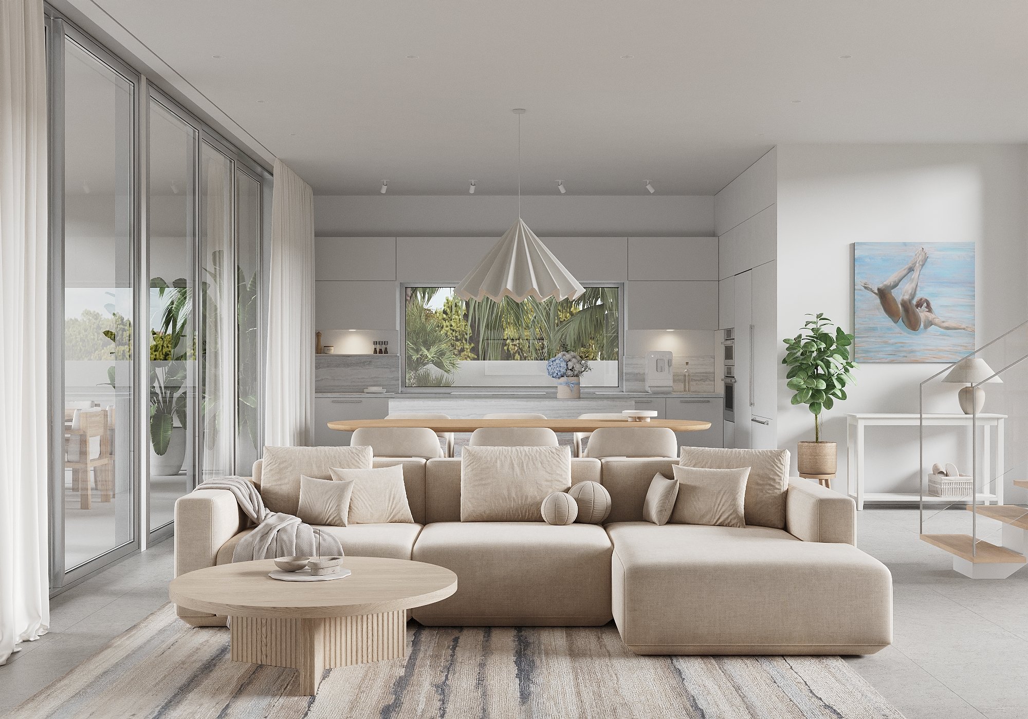 Bright and airy living room and kitchen with beige sectional sofa, light wood coffee table, potted plant, large sliding glass doors, white curtains, and artwork of a woman diving into water.