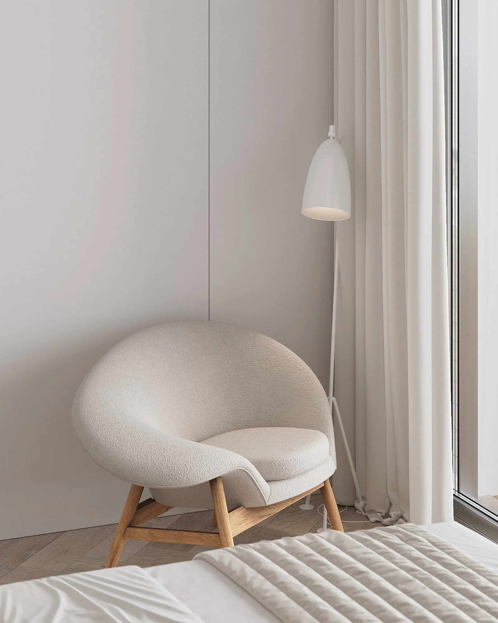 A cozy bedroom corner with a modern white fabric armchair, a white floor lamp, light-colored curtains, and a glass window letting in natural light.