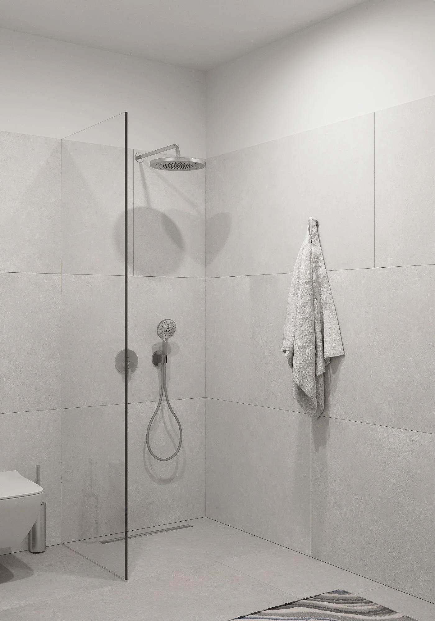 Minimalist bathroom shower area with white tiles, a wall-mounted showerhead, a handheld shower, and a towel hanging on the wall.
