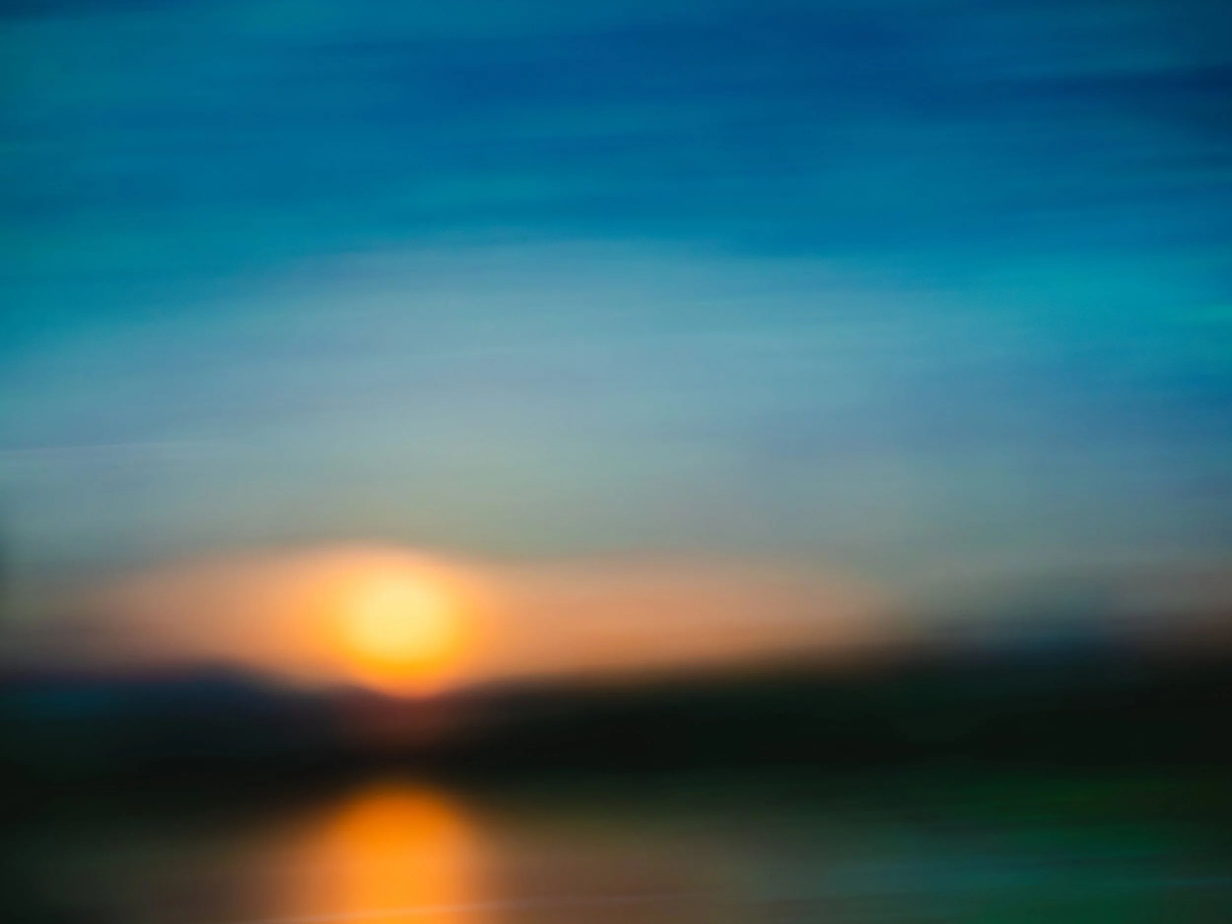 "Couché de soleil au bord du lac"