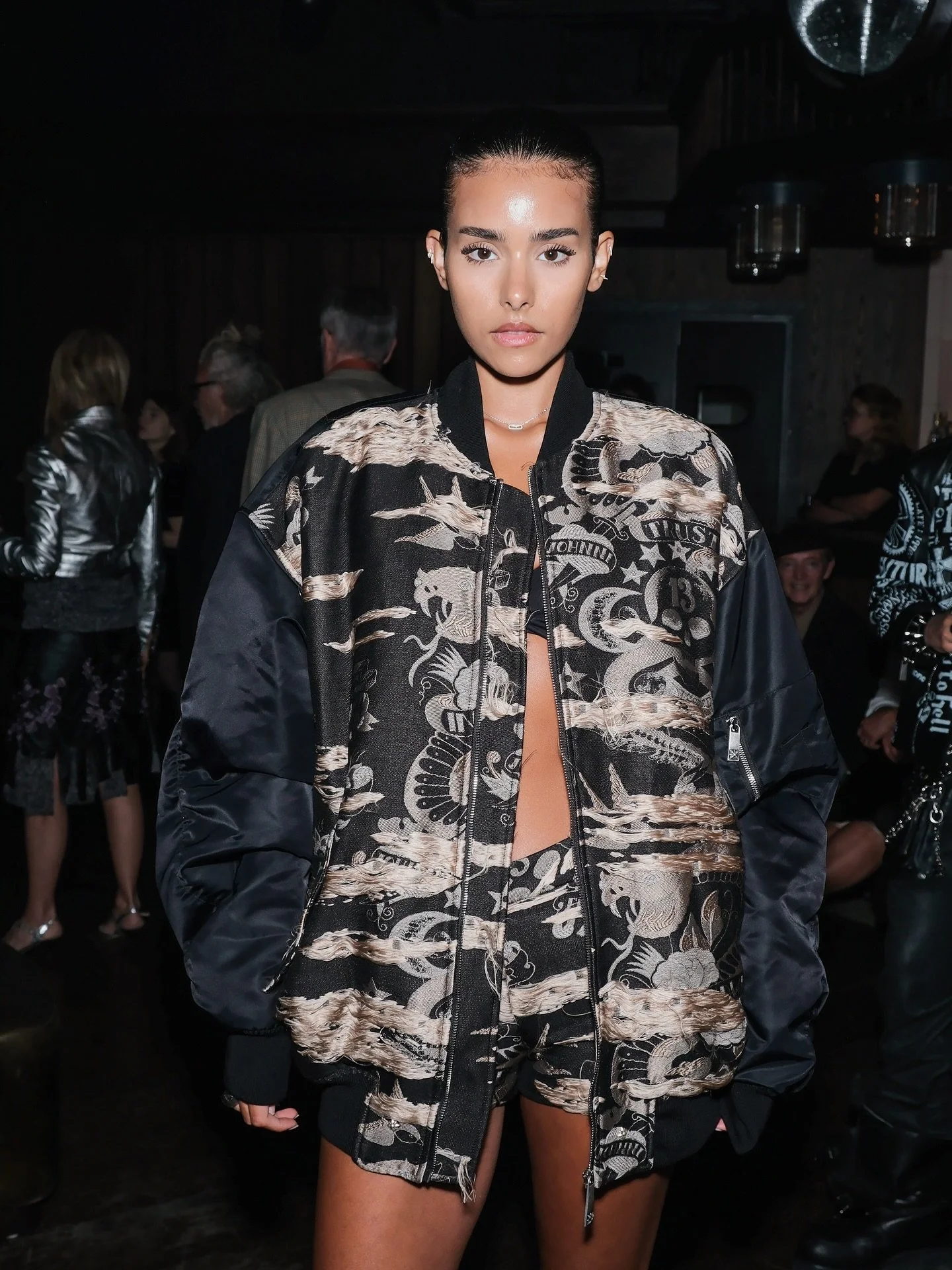 Riz attends the John Richmond SS26 show in LFW