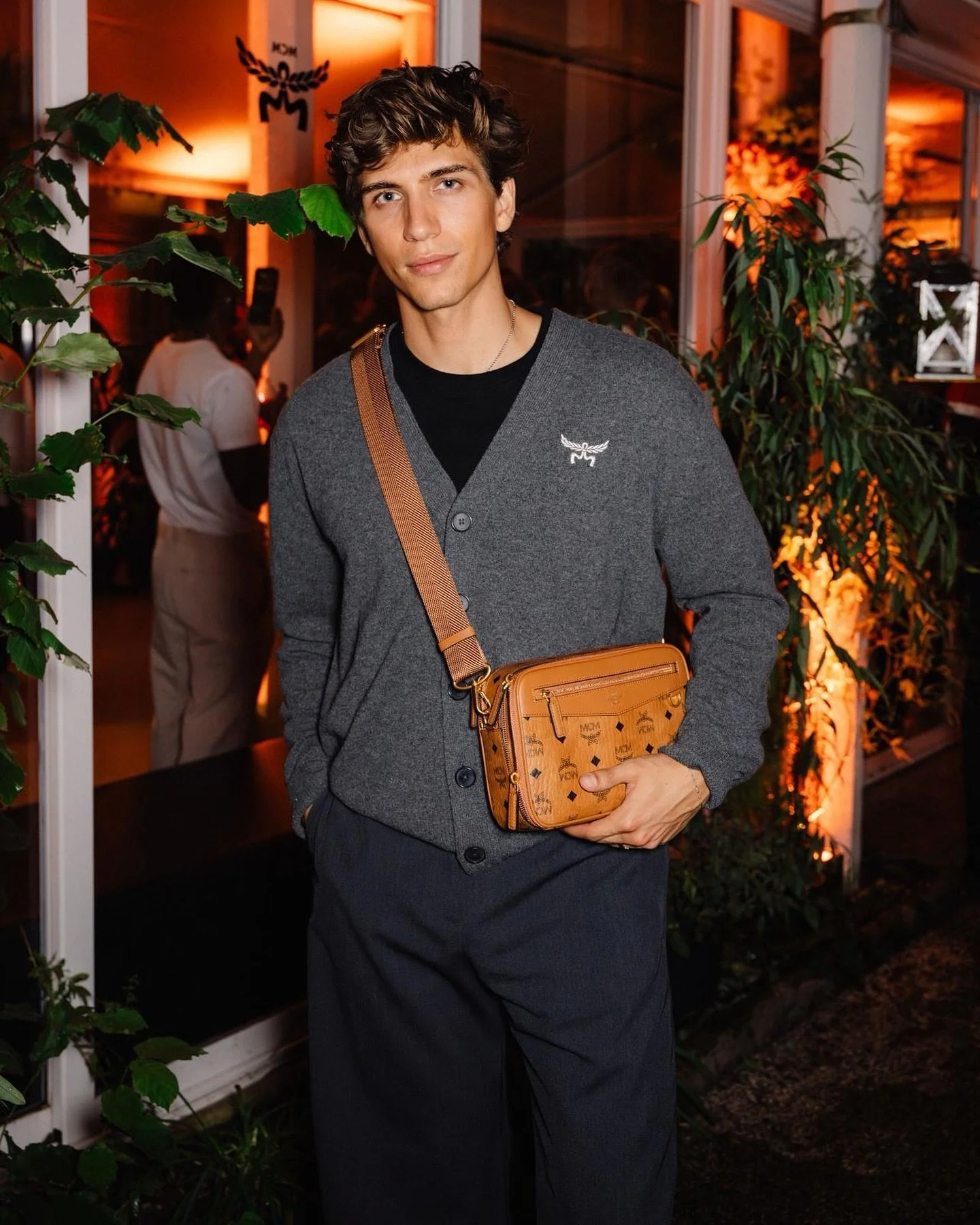 Amai attends the MCM SS26 Presentation as one of their Mavericks