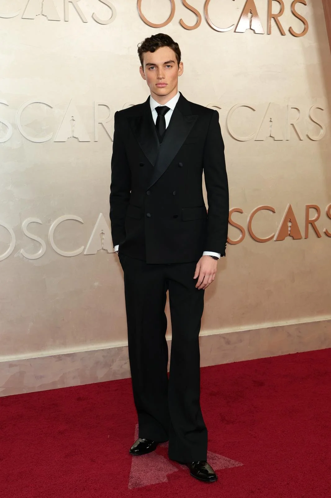 Kit Price attends the 97th Academy Awards in Los Angeles wearing Dolce & Gabbana