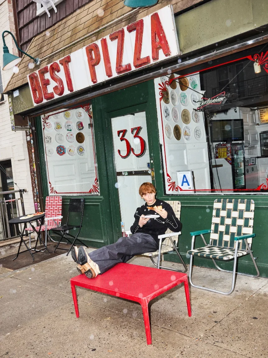 calum-harper-casual-street-scene-best-pizza.webp