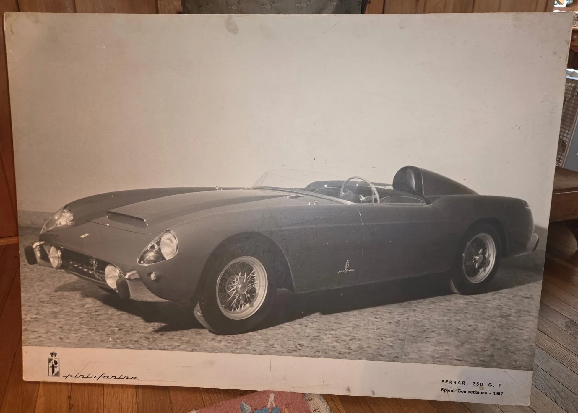 Display from the Pininfarina stand at the 1957 Turin Auto Show featuring the freshly bodied 1957 Ferrari 250 GT Spider Competizione chassis 0663GT. 39"x28" on fiberboard. Display given by Battista "Pinin" Farina to Luigi Chinetti after the show. Chin