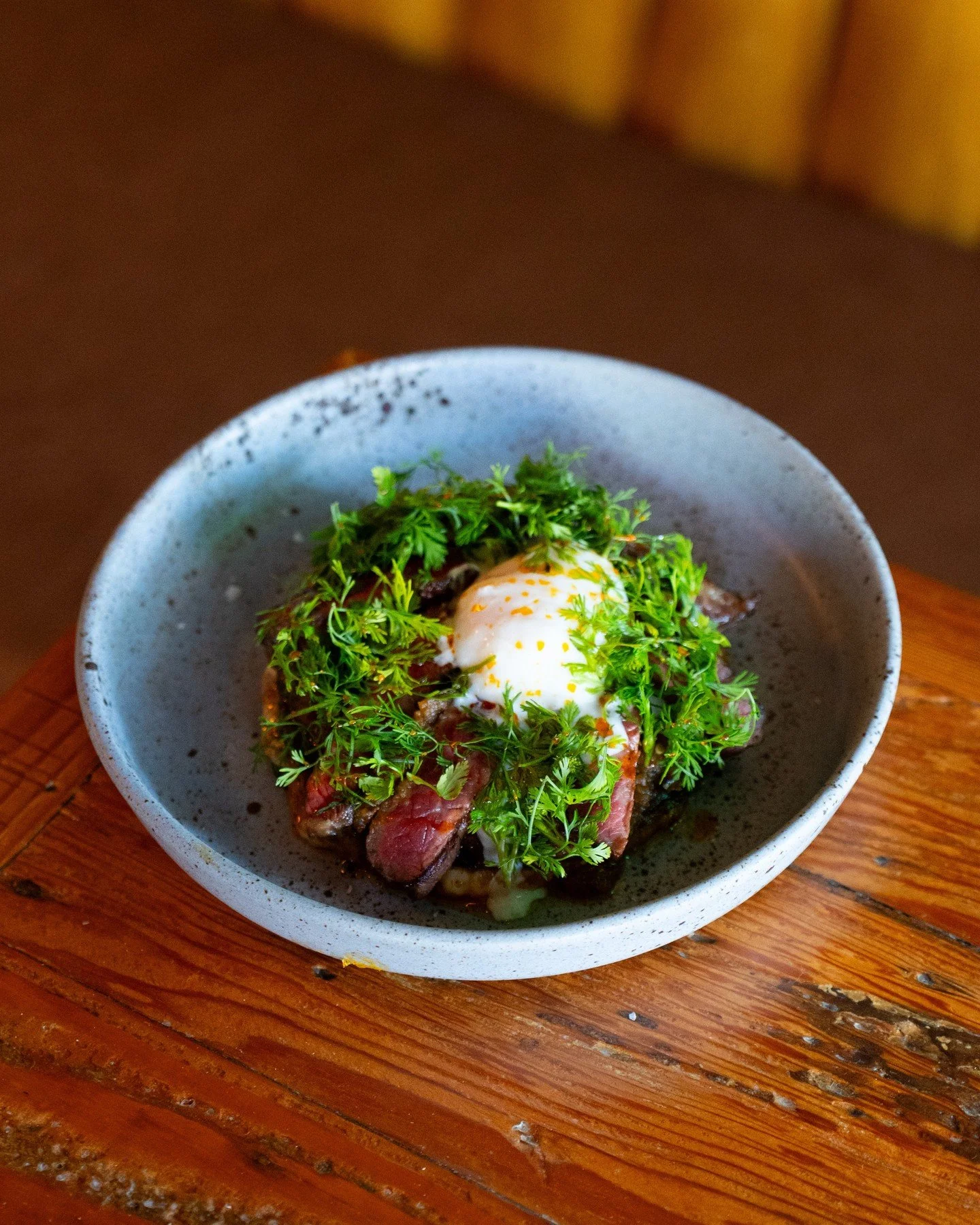 Not your average steak &amp; eggs. These are our Empalmes Norte&ntilde;os. Made with grilled hanger steak, Chihuahua cheese, poached egg, corn tortillas, and frijoles puercos.⁠ ⁠
⁠
#daisyla #daisymargaritabar