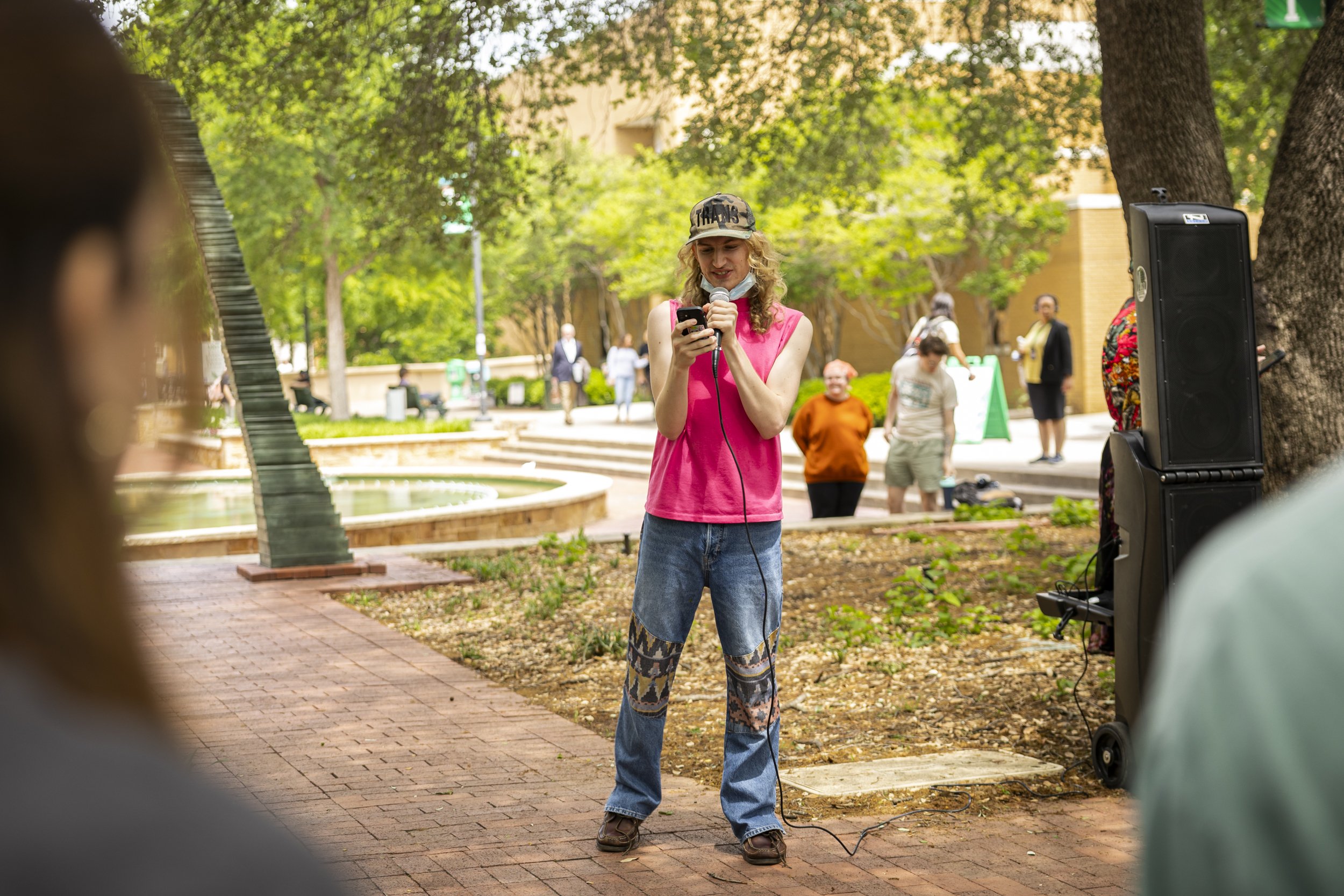YDSA Chair Arden Larsen led the group, delivering speeches at the start of the UNT Protest for Drag that took place on Wednesday, April 23, 2025. The speaker began screaming chants, and the crowd repeated them back.