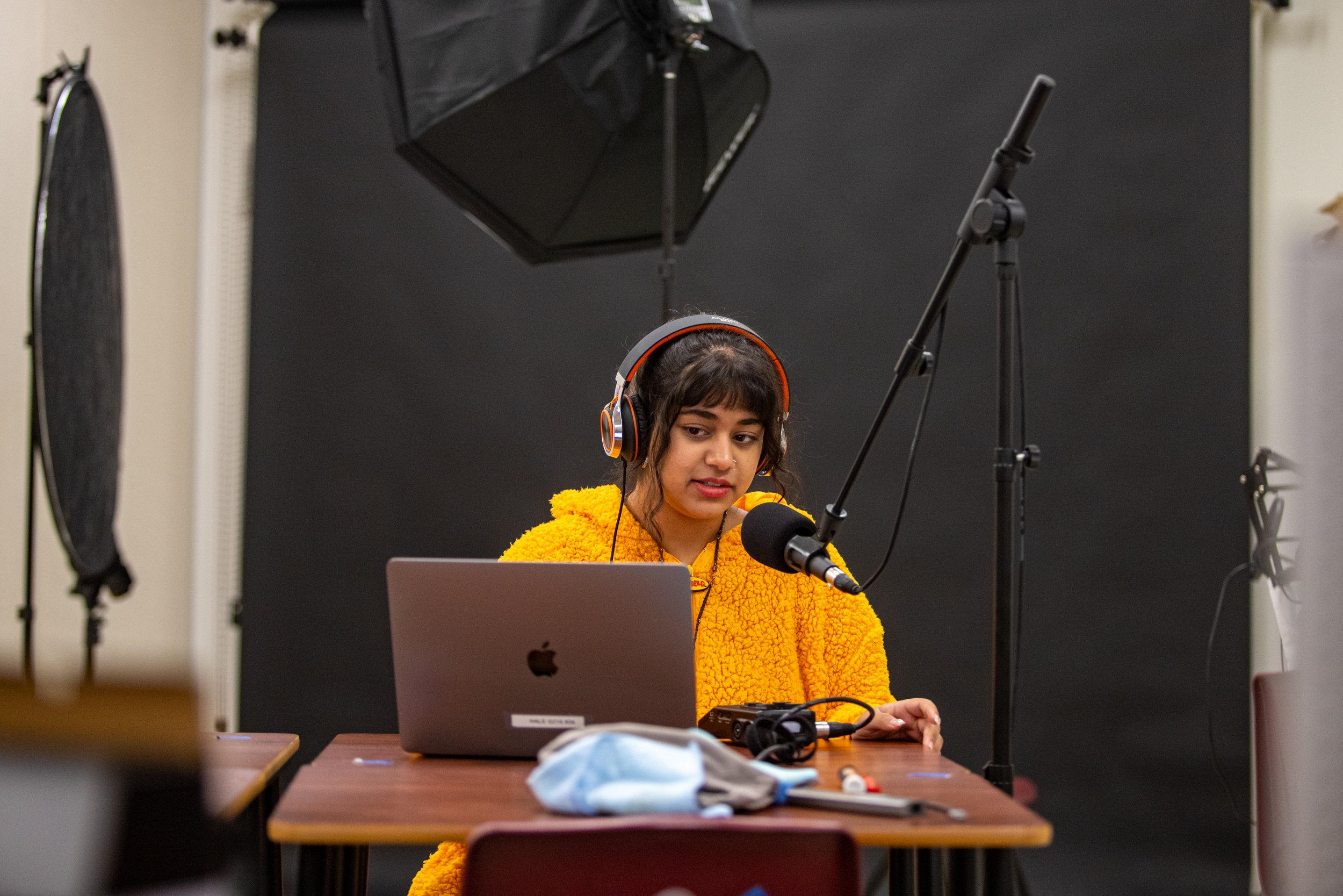 Student Saffa Shaikh records her outro and other soundbites she might need to finish her Halloween-themed podcast. Shaikh is a sophomore who enjoys Halloween, one of her favorite holidays. She thought it would be a good idea to add sound effects of a