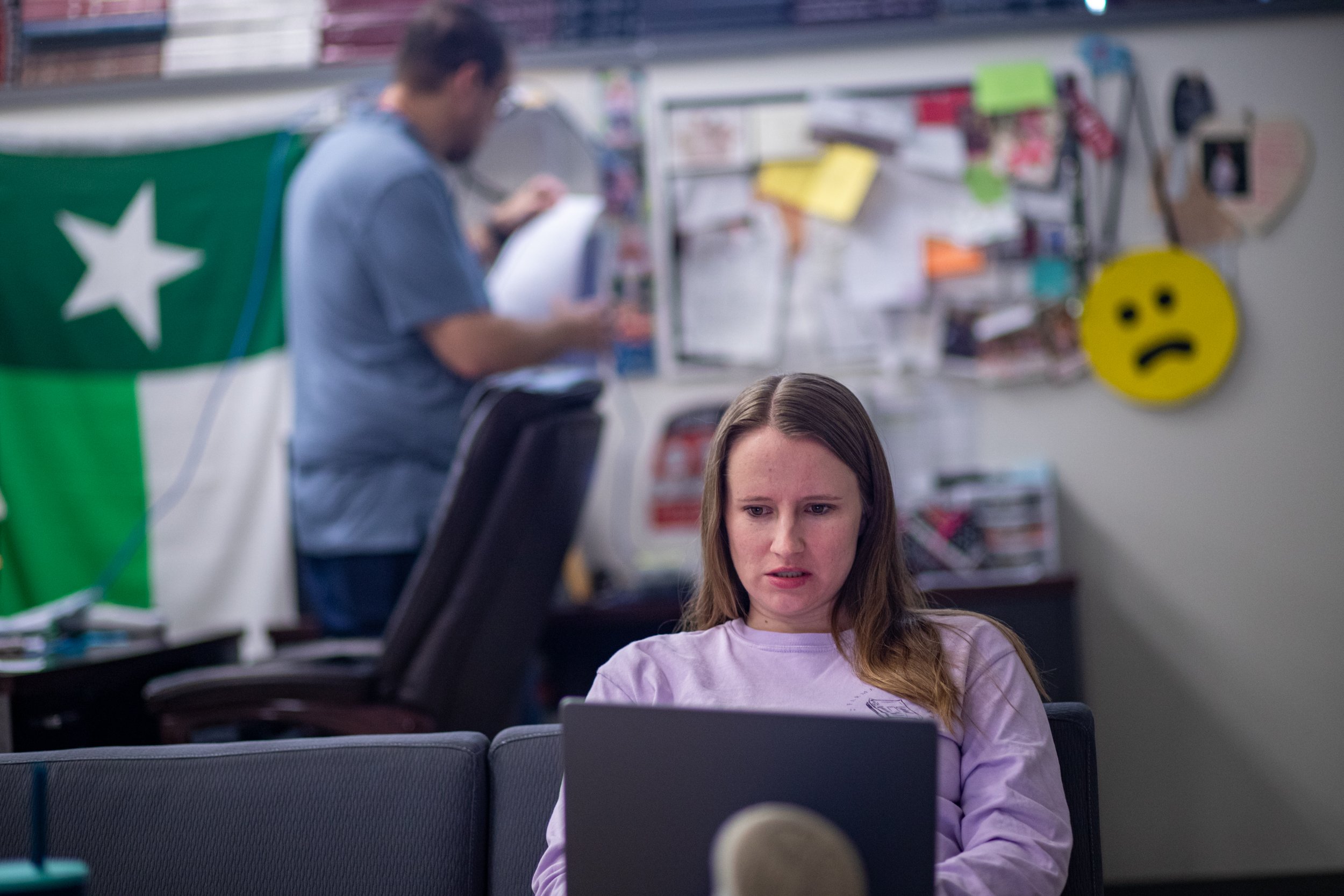 Elizabeth Pinkham, adviser to the Lewisville High School yearbook and newspaper, cleans up last minute sidebars on spreads before sending them off to the printer. Once the printer has received the pages, they cannot be returned for edits, so they are