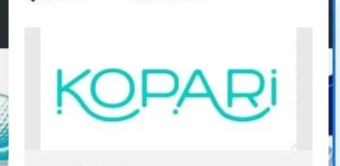 Close-up of a digital screen displaying the text 'KOPARI' in turquoise letters with a curved line underneath, part of a website or digital interface.