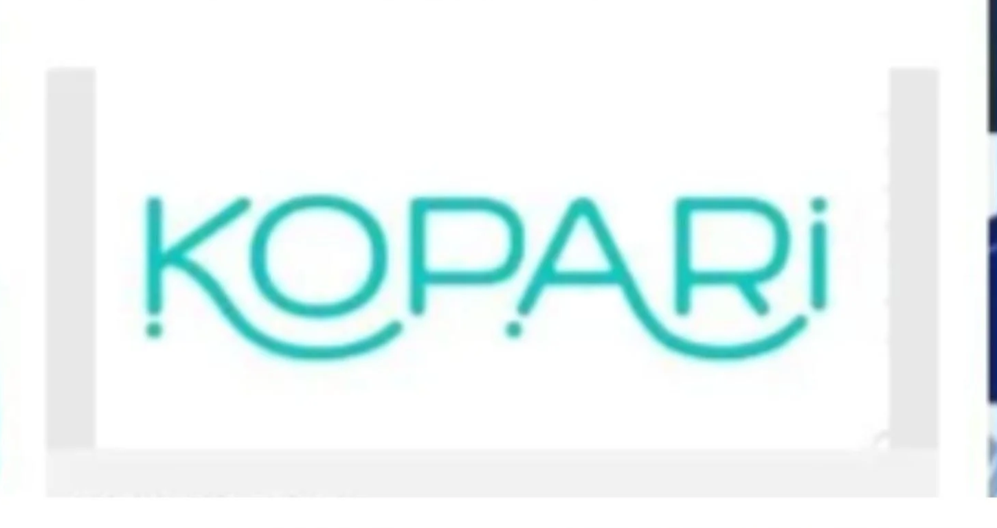 Close-up of a digital screen displaying the text 'KOPARI' in turquoise letters with a curved line underneath, part of a website or digital interface.