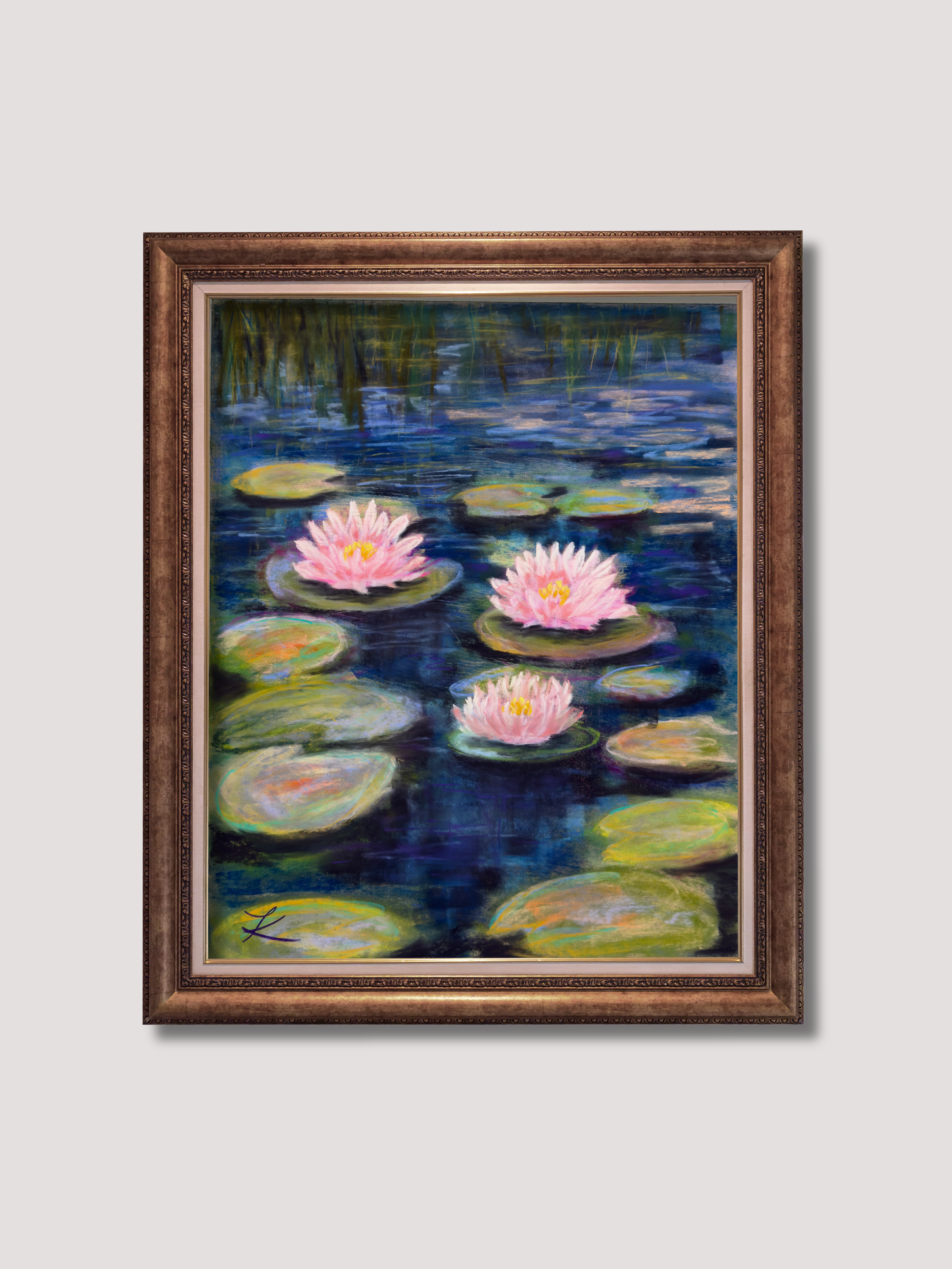 Framed soft pastel painting of three pink water lilies on a blue pond with green lily pads