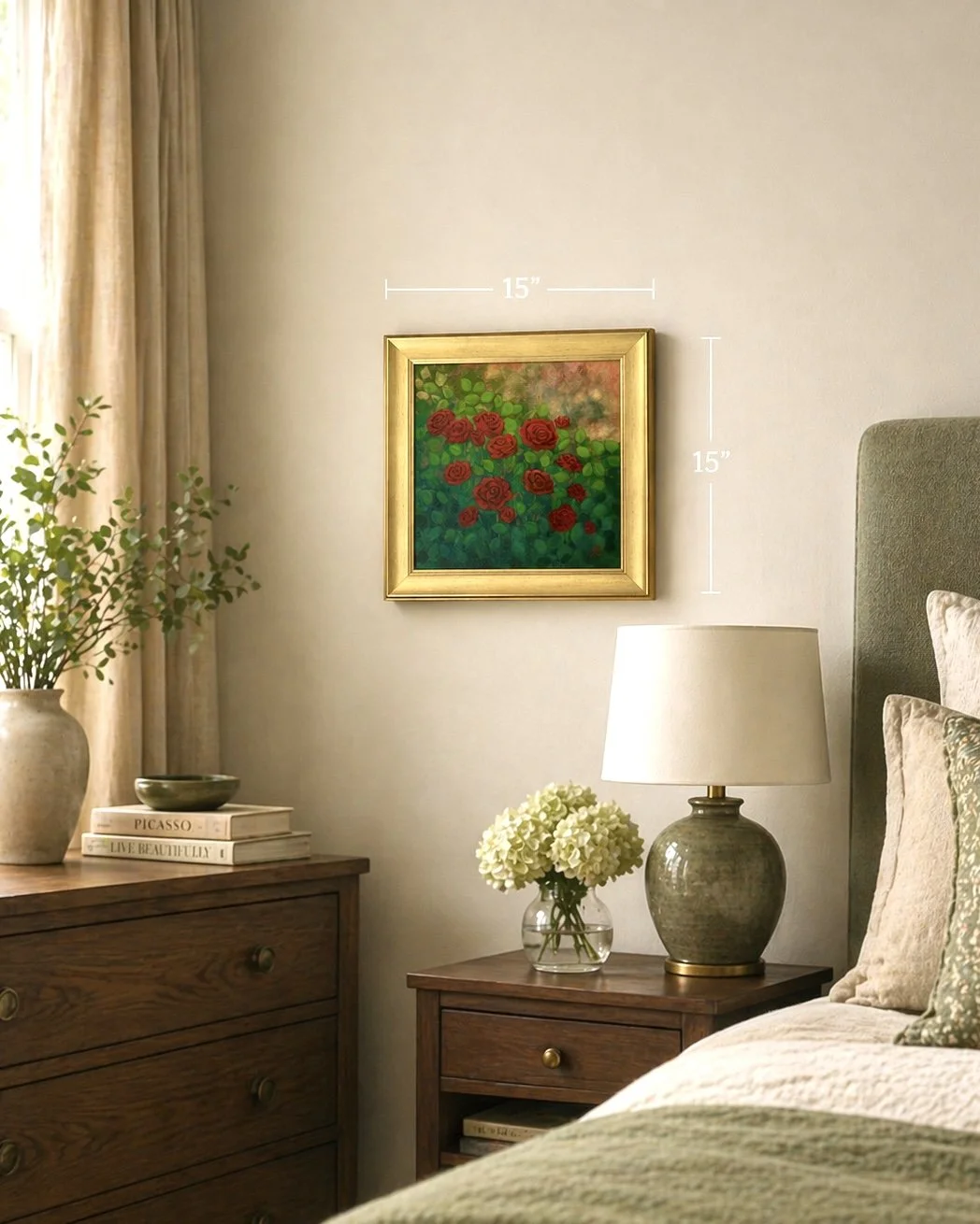 gold framed acrylic painting of red roses, hanging on a bedroom wall