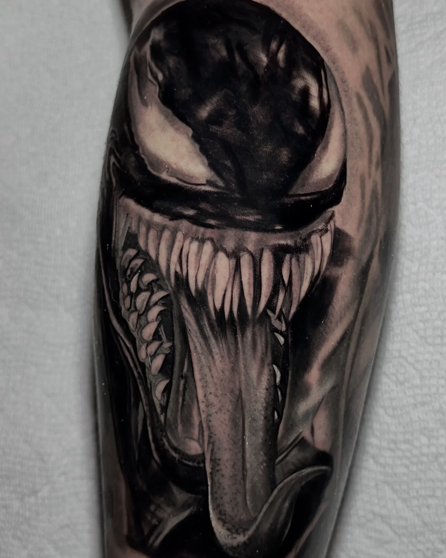 Venom tattoo black and grey Bryn beer river market tattoo company 