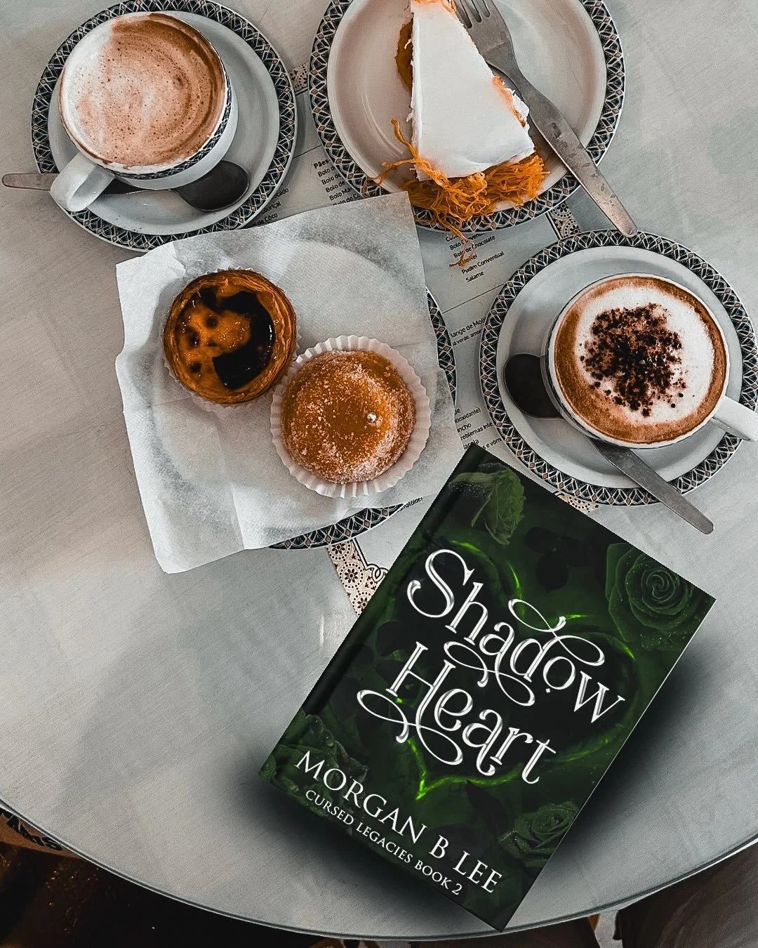 &ldquo;Twisted souls like ours can&rsquo;t help belonging together, will of the gods be damned.&rdquo;

Shadow Heart, Curse Legacies book 2. This was SO GOOD, and so much spicier than book one! Secrets were revealed, bonds were tested and tightened. 