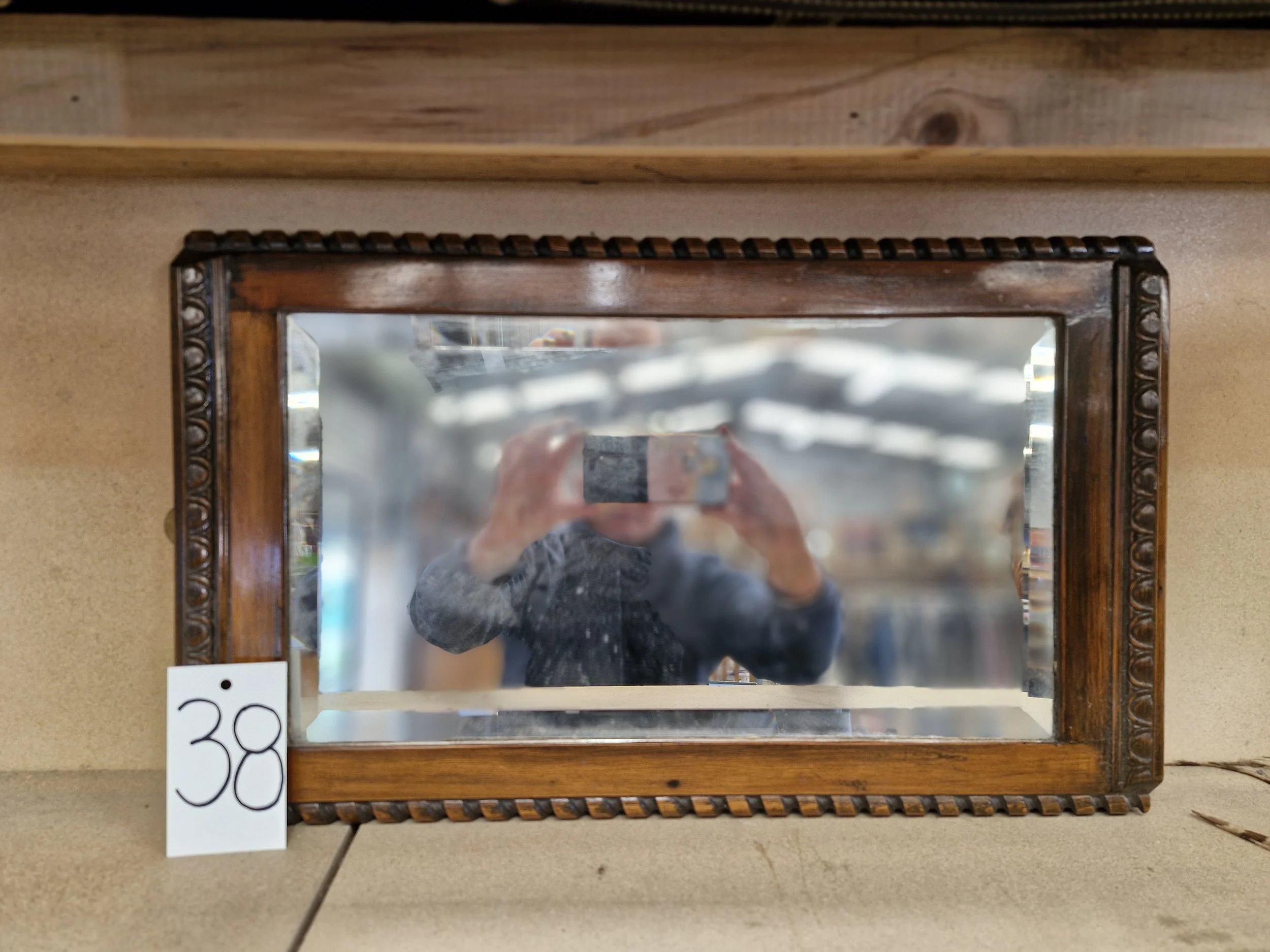 Mirror with wooden frame