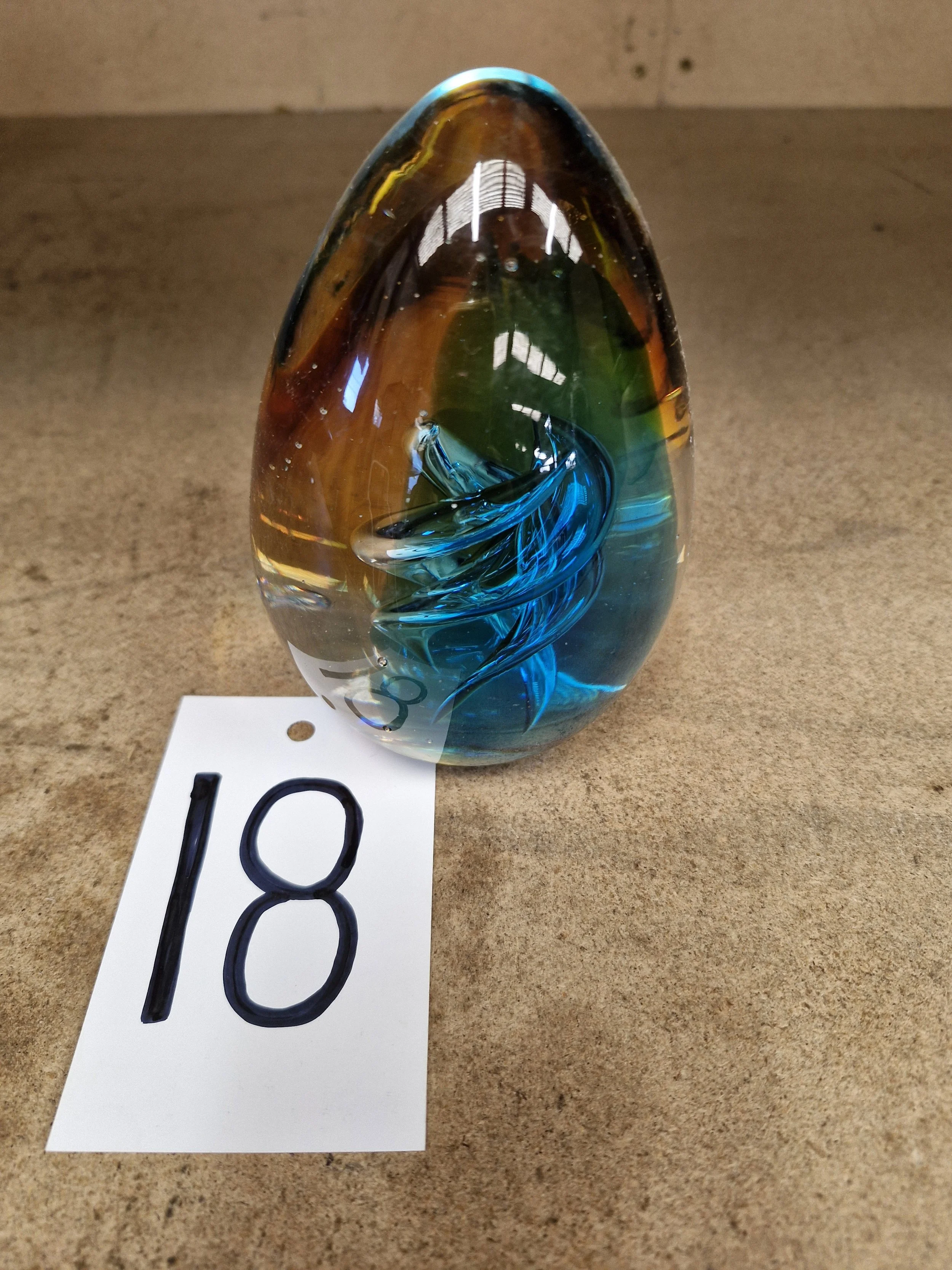 Egg-shaped art glass paperweight