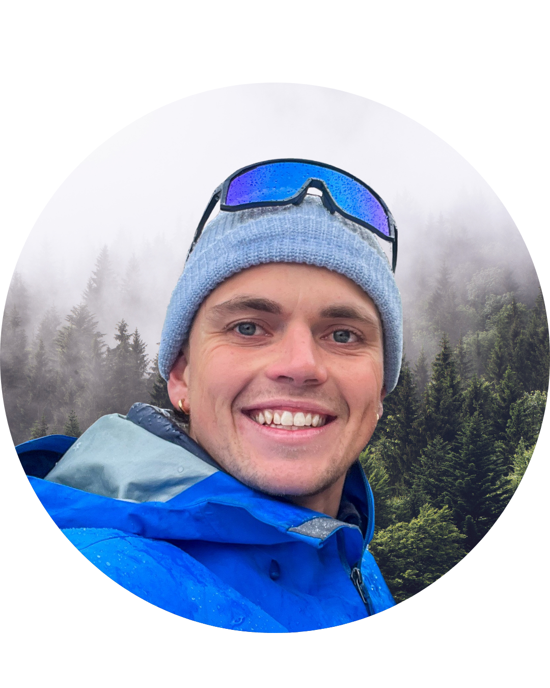 Arthur smiling in outdoor hiking clothes