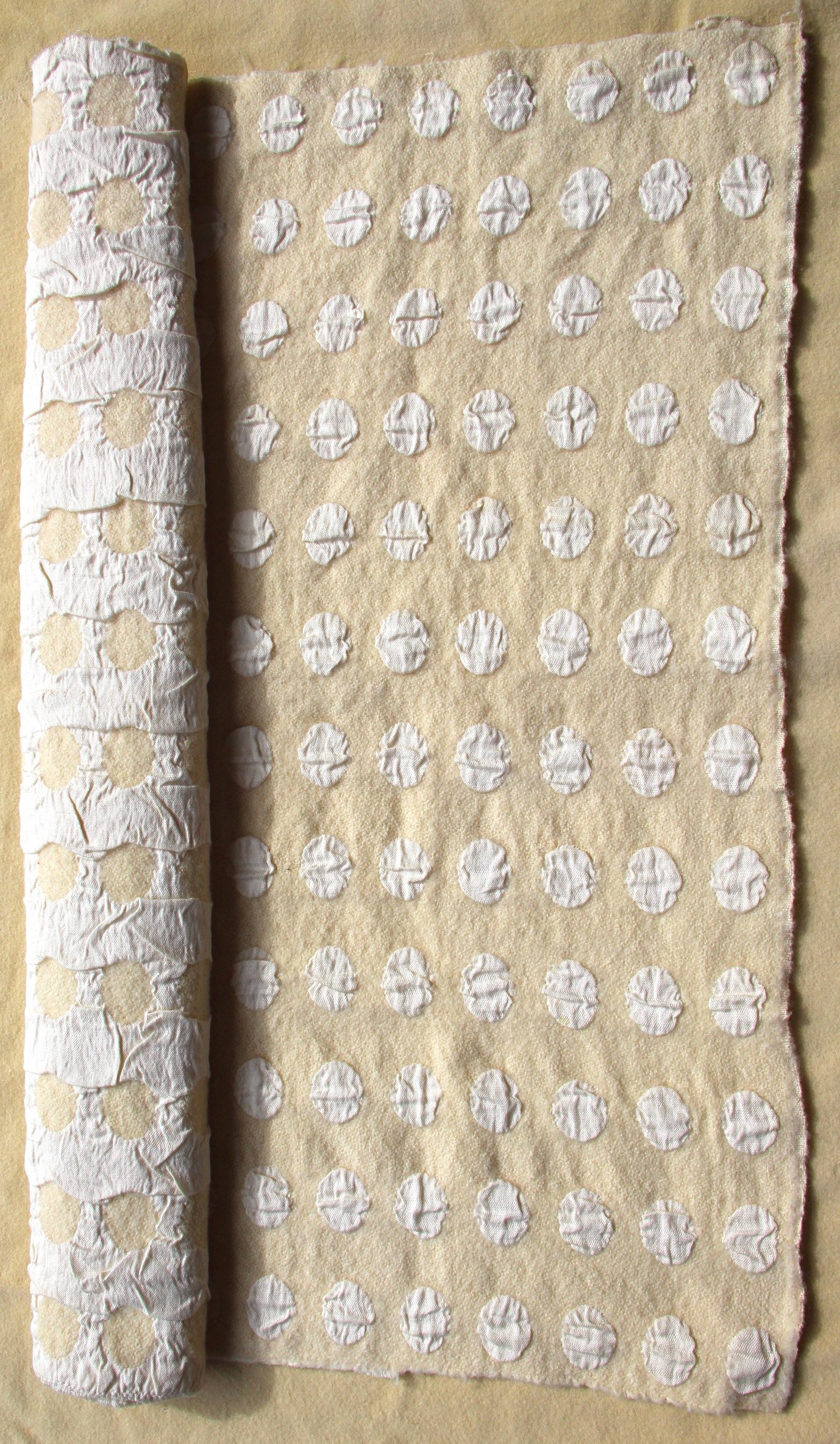Wall Hanging — Double Weave
woven on Jacquard loom—
Linen and wool, felted to create puffed circles