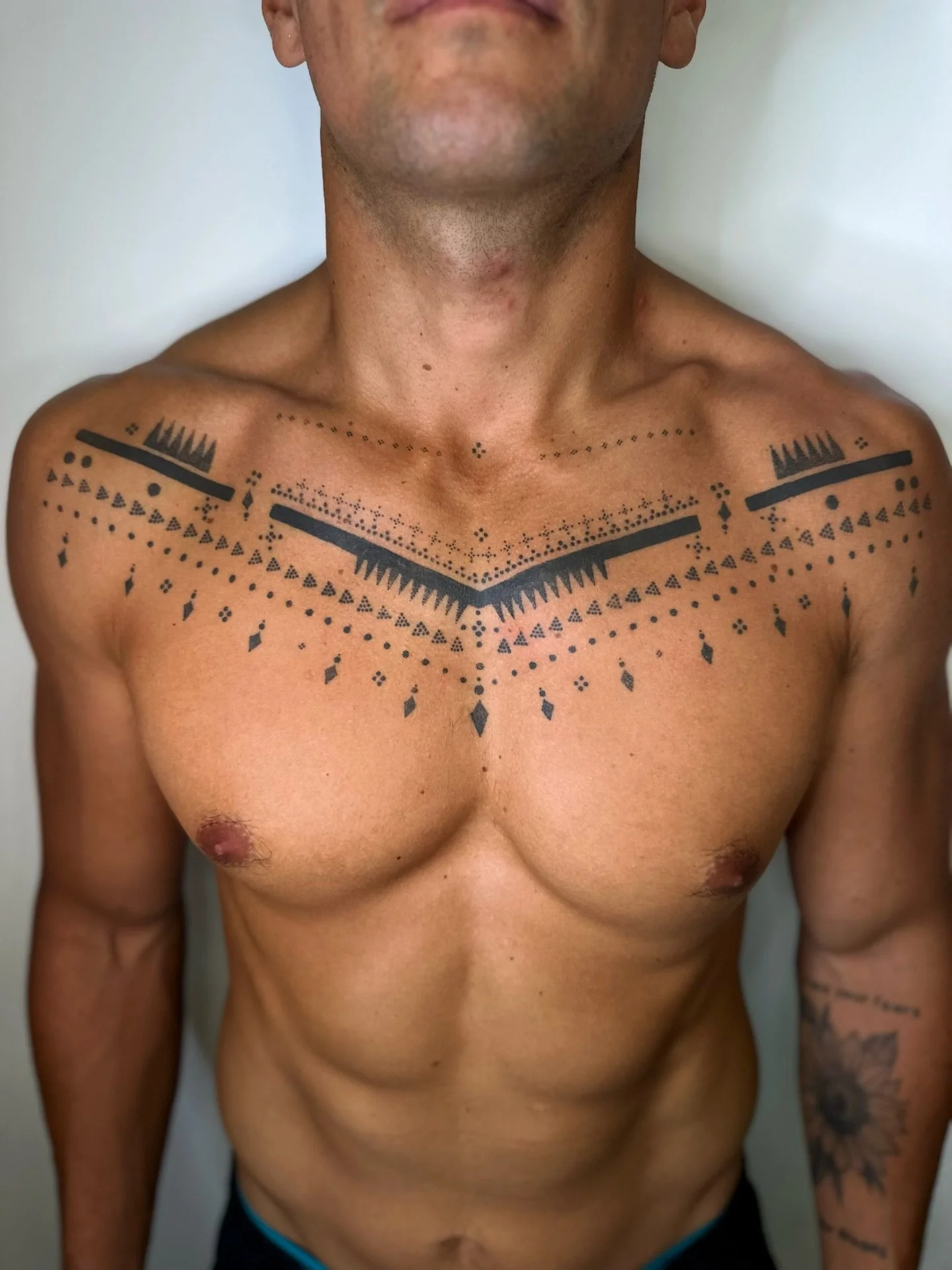 Ornamental chestpiece designed to flow naturally with the body ✨ 
I love how this kind of design follows the anatomy and enhances the shape without overpowering it, just working with what&rsquo;s already there. 

Strong, clean lines that frame the ch