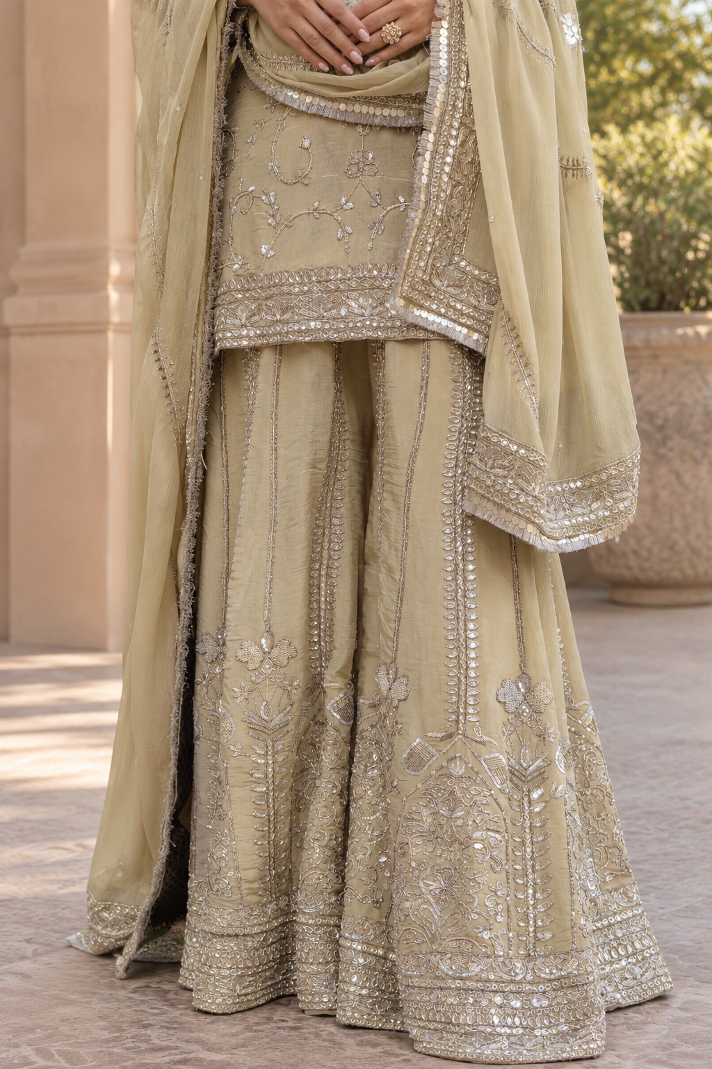 Sage Green Embroidered Lehenga in Courtyard.png