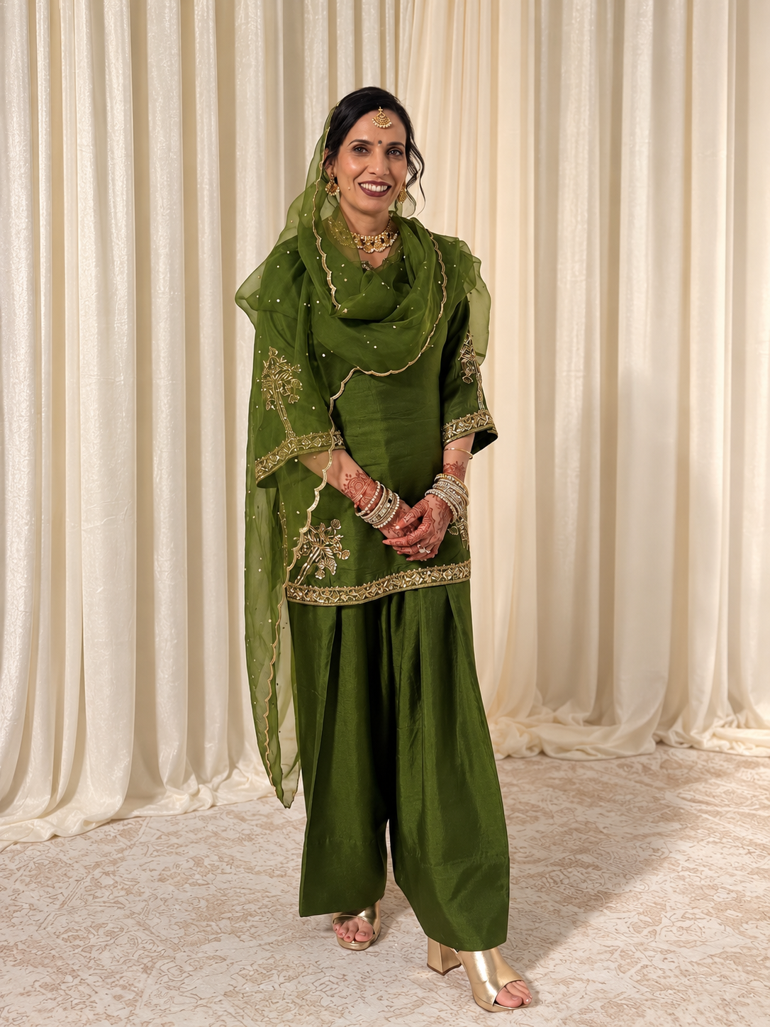 Emerald and Gold Bridal Portrait.png