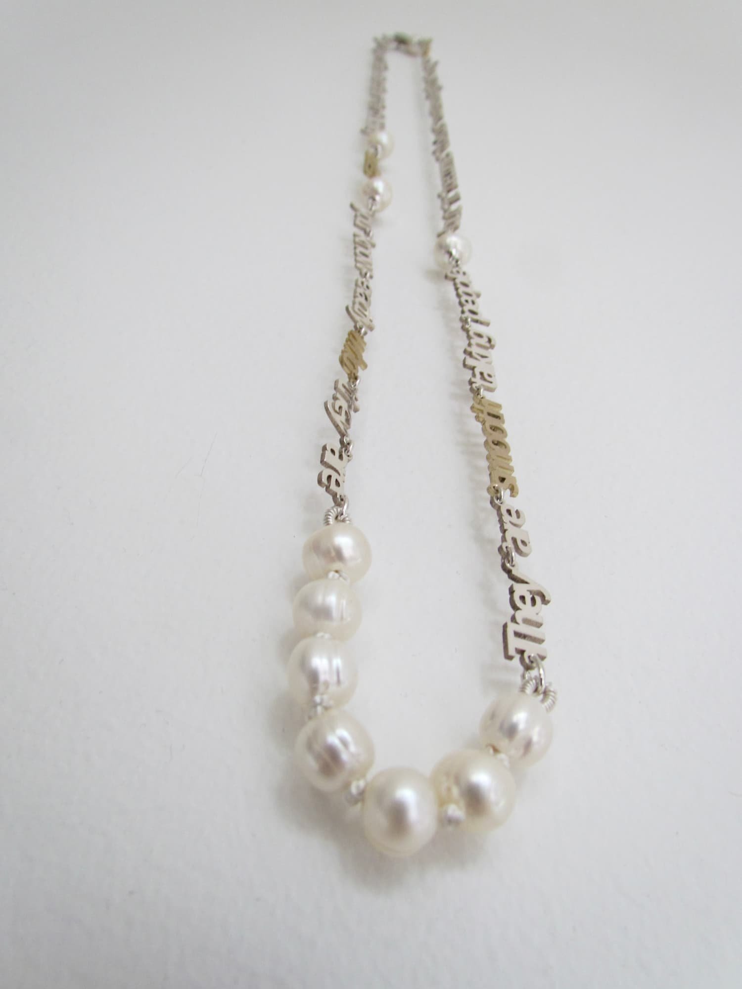 "They are smooth talking people"
Necklace -
Pearls, Sterling Silver, 9ct Yellow Gold