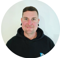 Gray background with a white placeholder icon of a person.