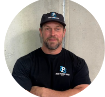 Generic user profile icon with a gray background, featuring a white silhouette of a person.