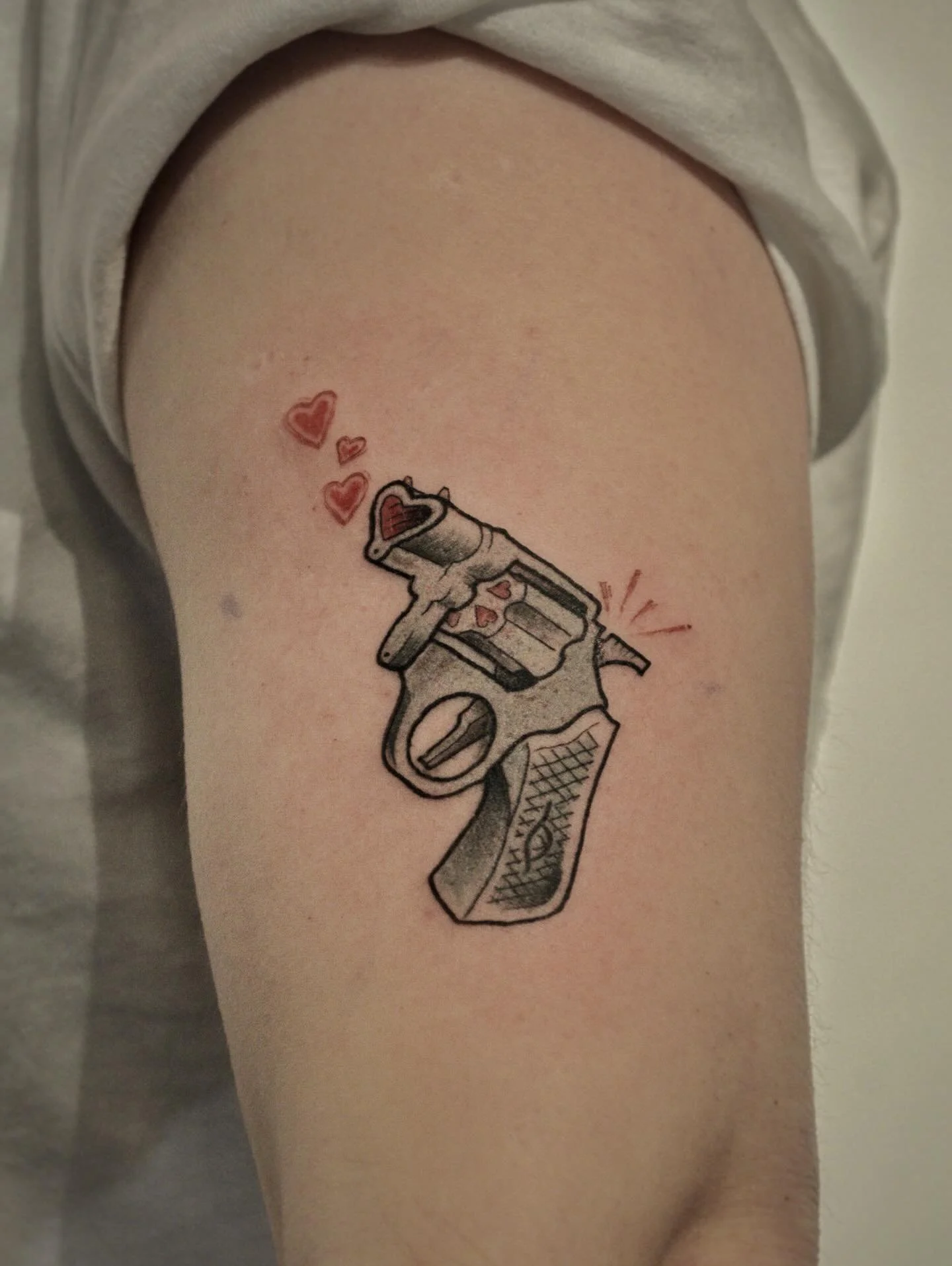 LOVE GUN 💕🔫 
from #valentineflash 
@studio.zuiver 
Want smth interesting on your body?
💌 DM me and let&rsquo;s discuss 
.
#vldrtattoo
#людокол
#tattooflash