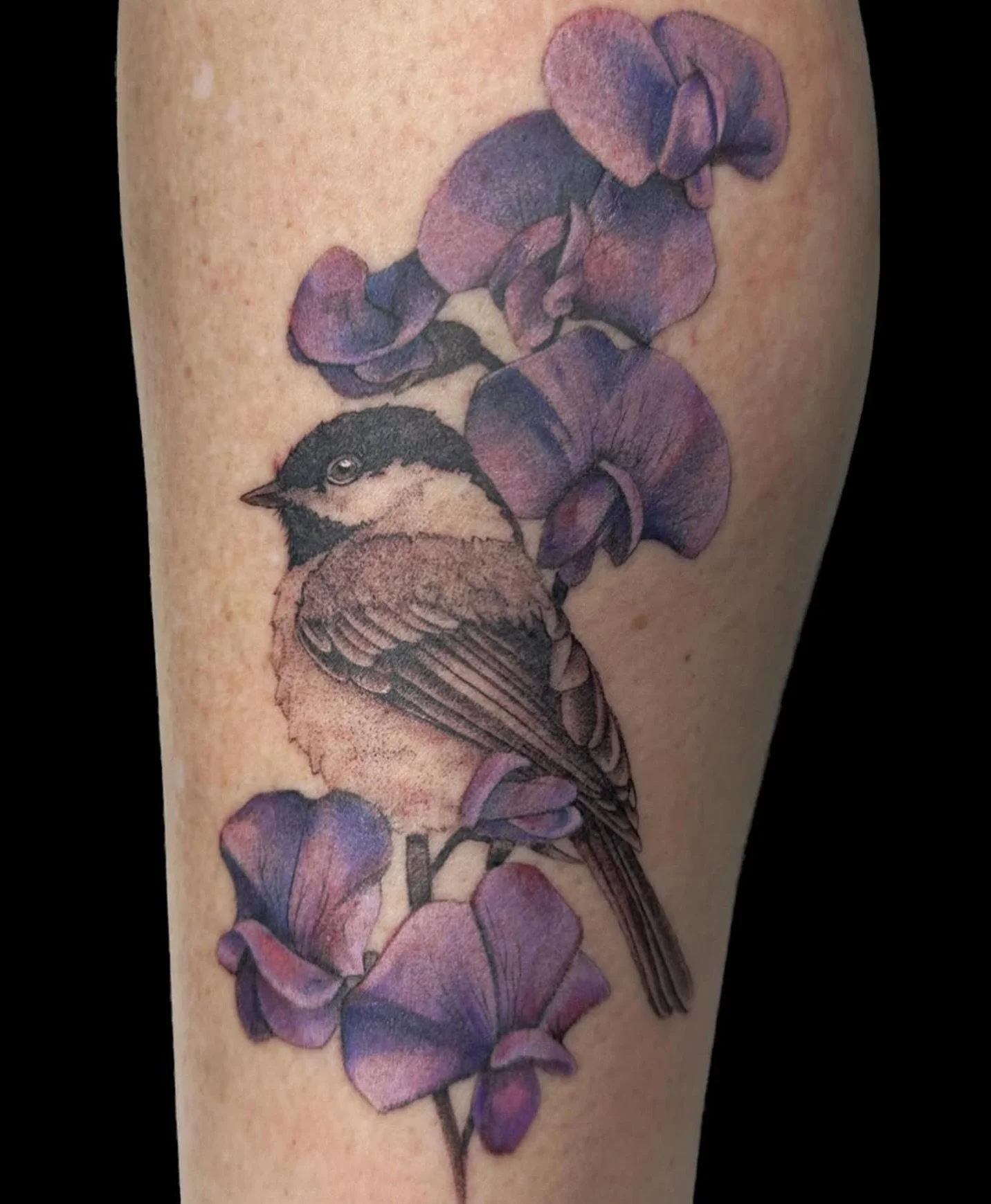 While incredibly subtle in this piece, I love combining black and grey with color! 

When done right, the tattoo doesn&rsquo;t look unfinished - instead it takes on a softness that speaks for itself!

I love tattooing birds and flowers - and they don