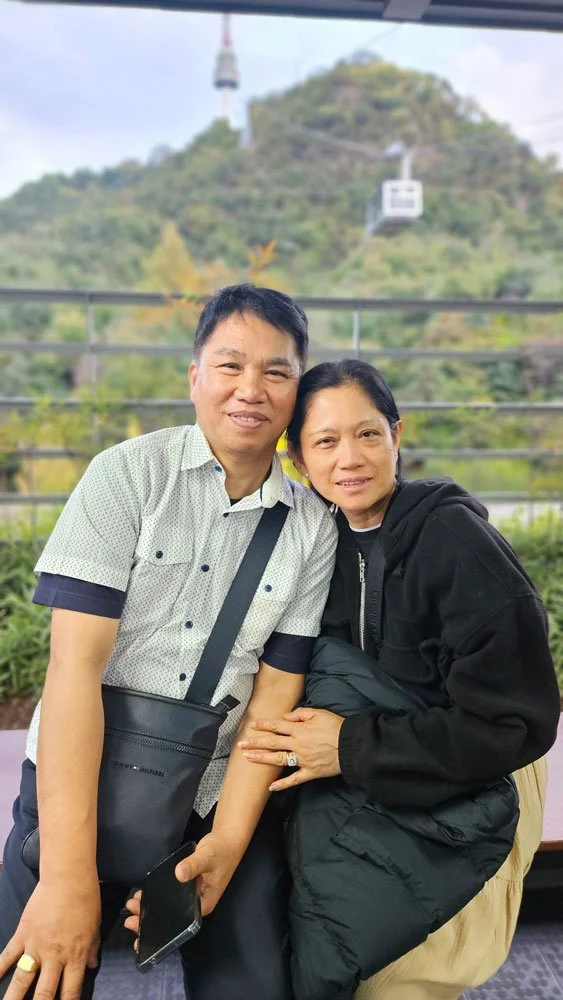 Private tour guests from the Philippines visiting the N Seoul Tower observatory deck.