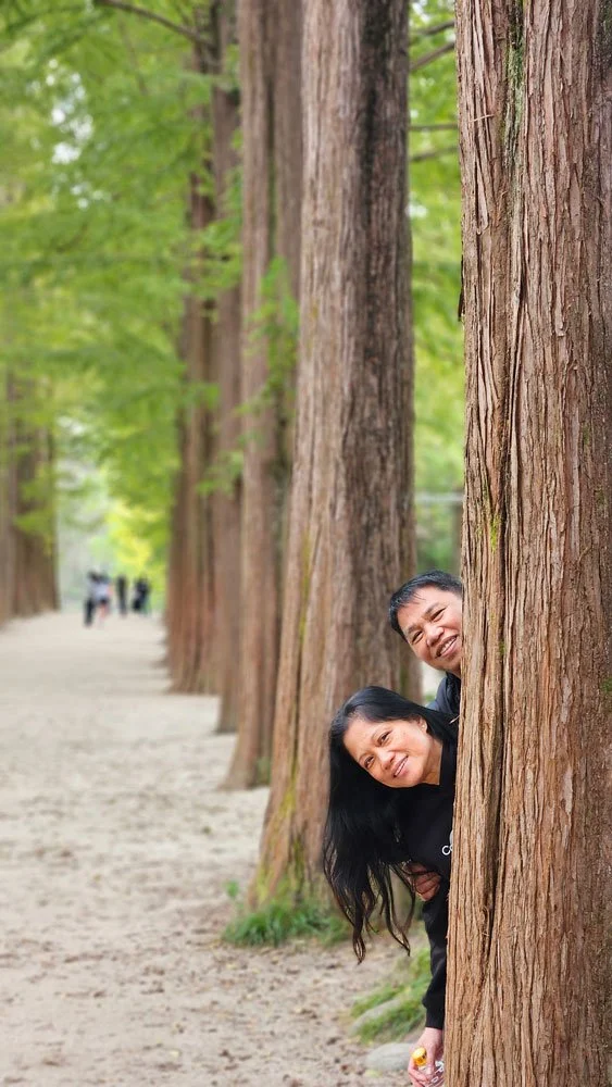 Filipino tourists posing near the Nami Island Central Park area during a private sightseeing tour.