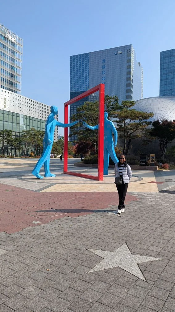 Private tour for Madagascar visitors at Pangyo Techno Valley, innovative technology hub, sleek architecture, business district atmosphere, realistic and detailed travel image