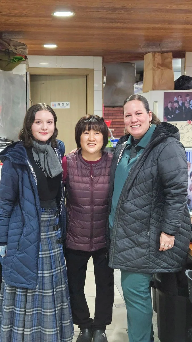 Mexico family enjoying authentic Korean food on a private tour in Seoul.