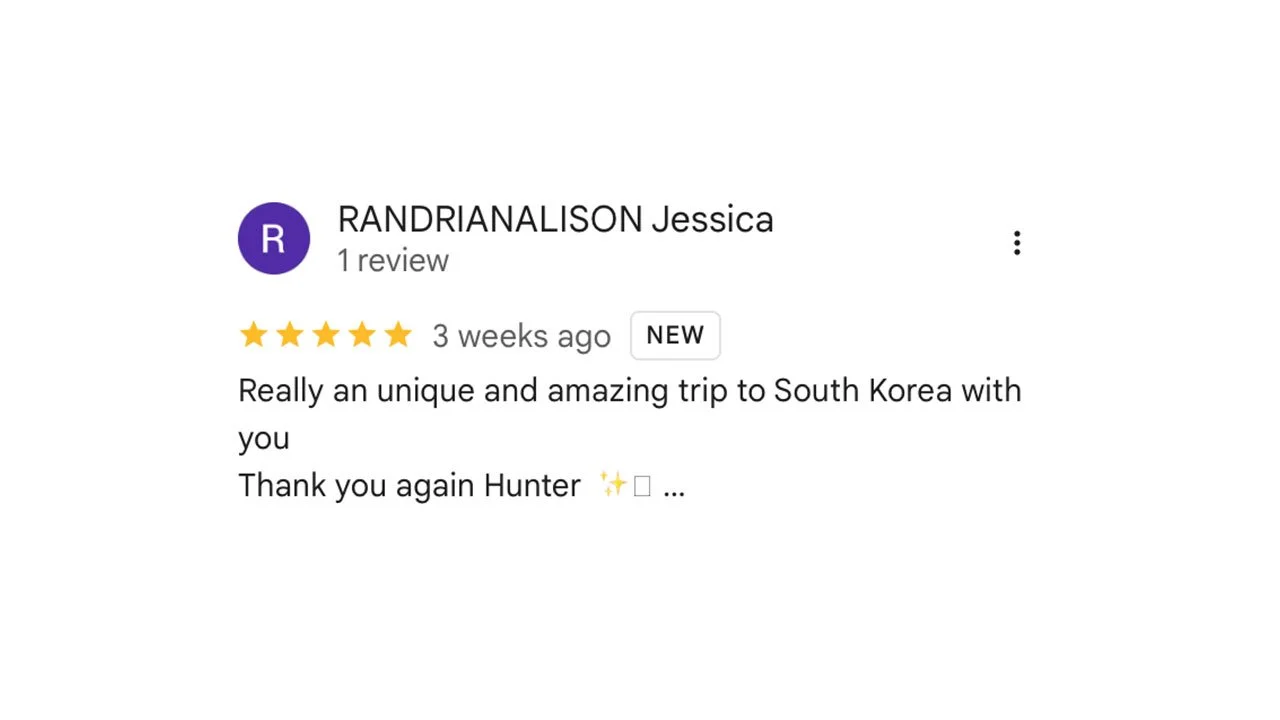 Visitors watching a traditional Korean cultural performance on a guided tour.