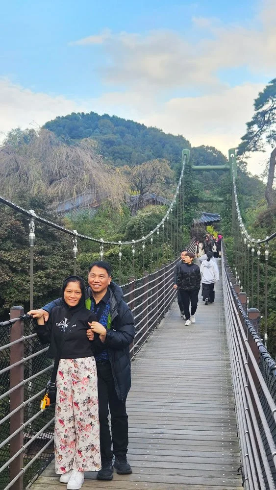 Filipino visitors admiring the traditional Korean garden architecture during a private tour.