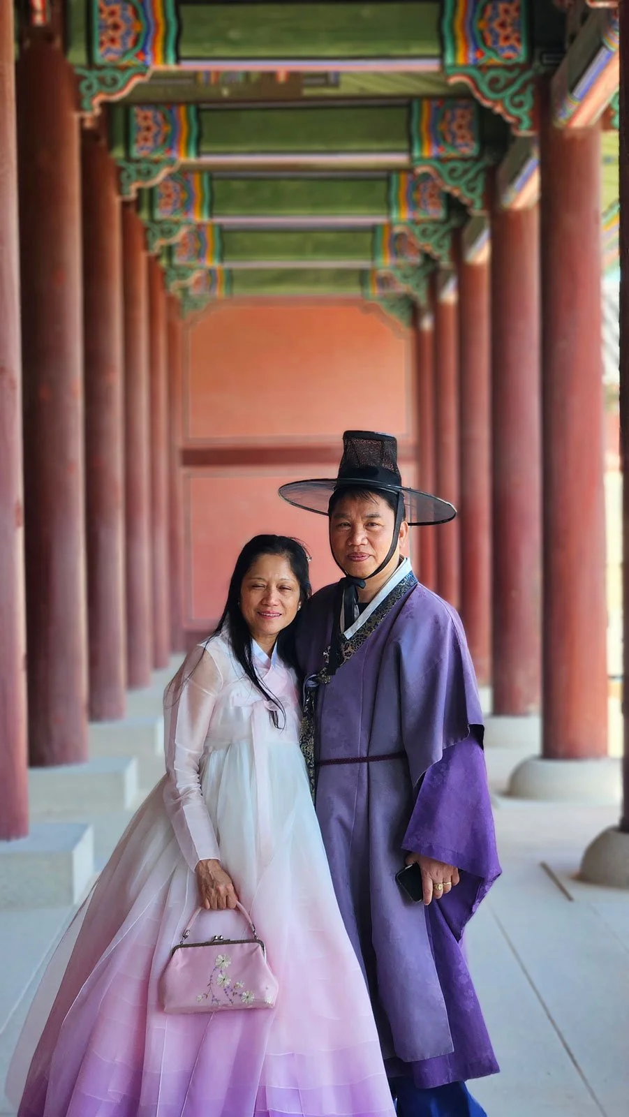 Filipino tourists wearing traditional hanbok during a private tour at Gyeongbokgung Palace in Seoul.