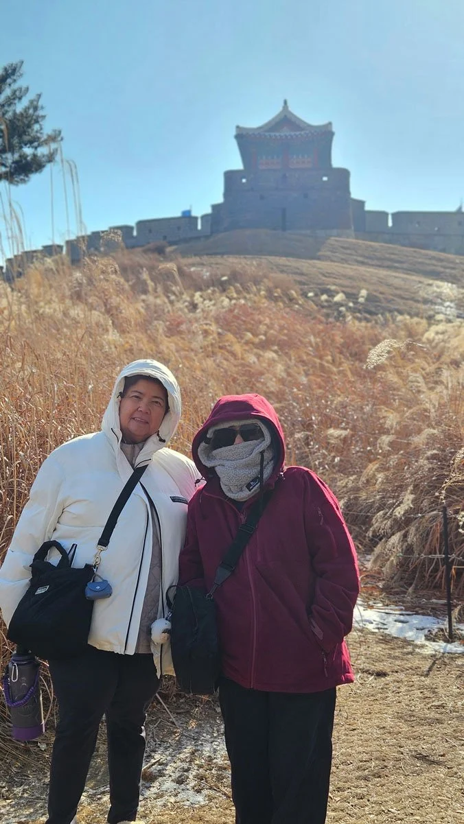 Filipino tourists exploring Hwaseong Fortress during Korea private tour