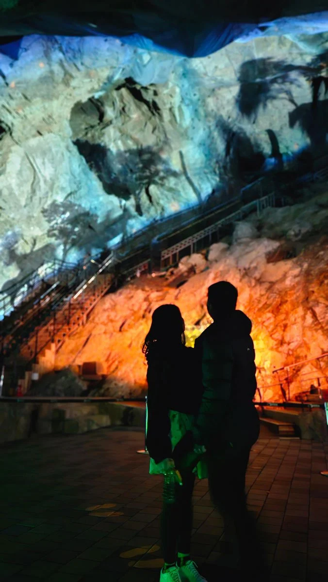 Filipino travelers admiring the cave’s rock formations and themed artworks at Gwangmyeong Cave.