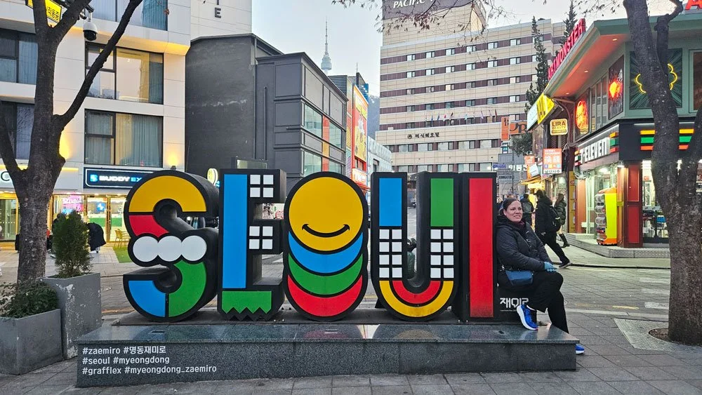 Mexico family enjoying street food in Myeongdong, Seoul.