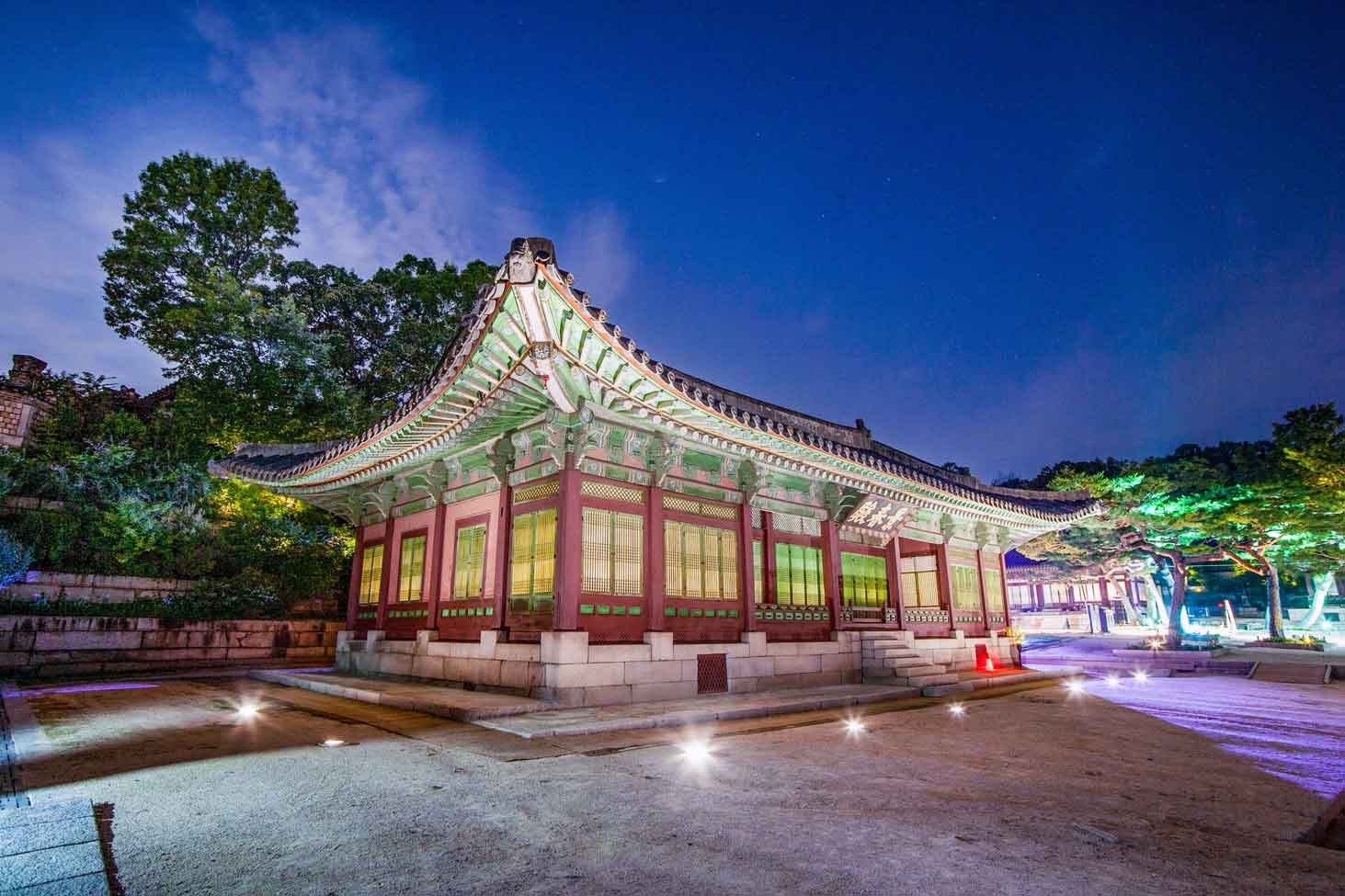 Visitors exploring the historic Changgyeonggung Palace grounds