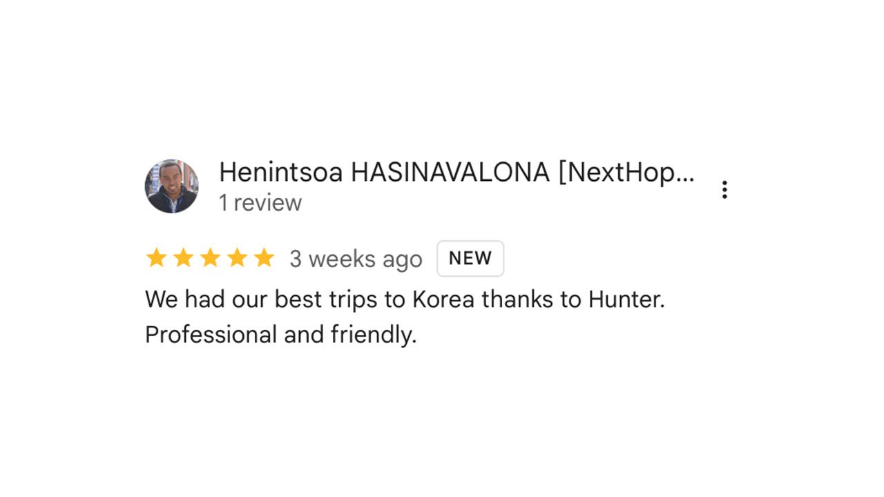 Visitors riding the Haeundae Beach Train and enjoying the coastal scenery.