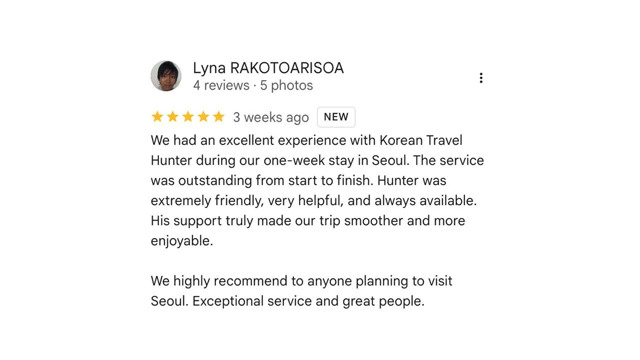 Guests taking photos at Namsan Seoul Tower during a sunset view on a private tour.