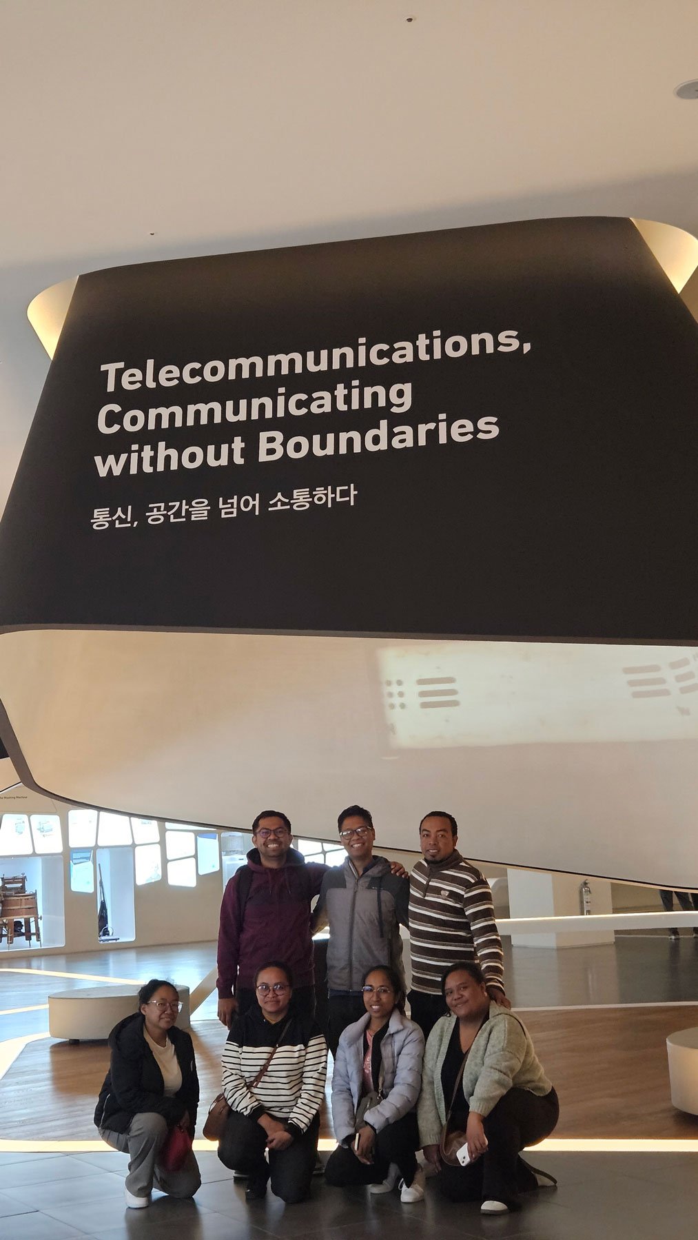 Private tour of Samsung Innovation Museum for Madagascar visitors, showcasing robotics, AI displays, and interactive technology exhibits, immersive perspective