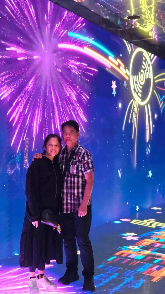 Filipino travelers on a private tour viewing the iconic G Tower in Songdo, Incheon’s international business district.